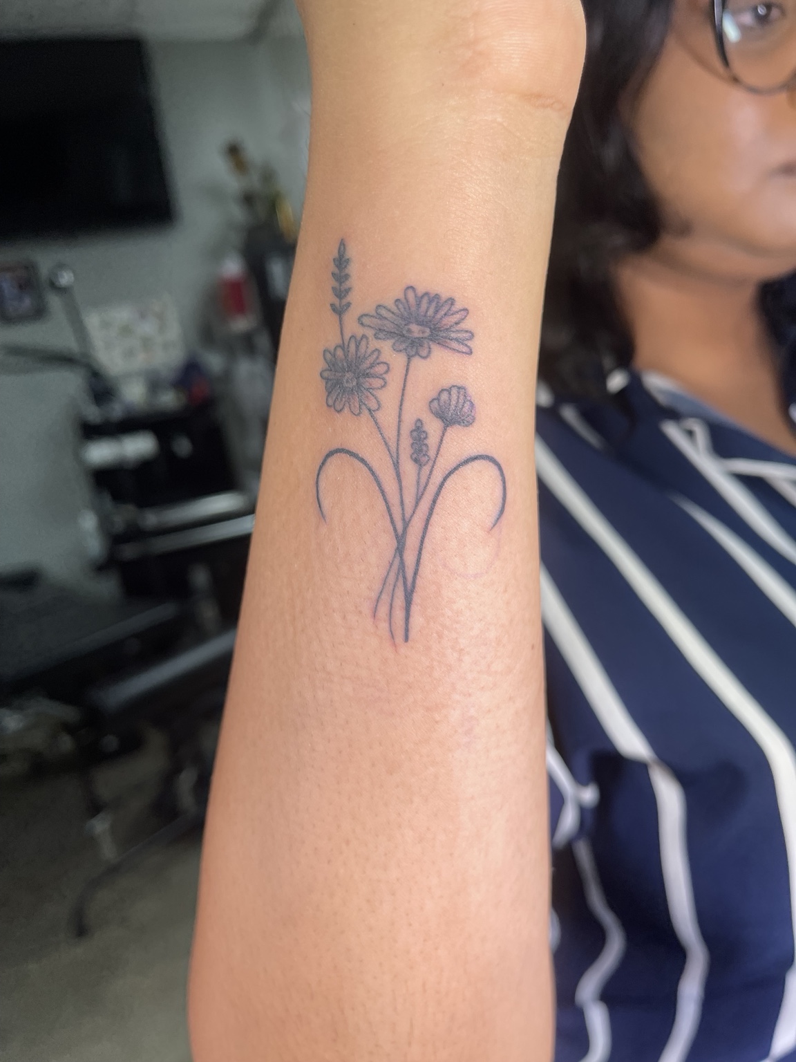 2020 floral sprig tattoo