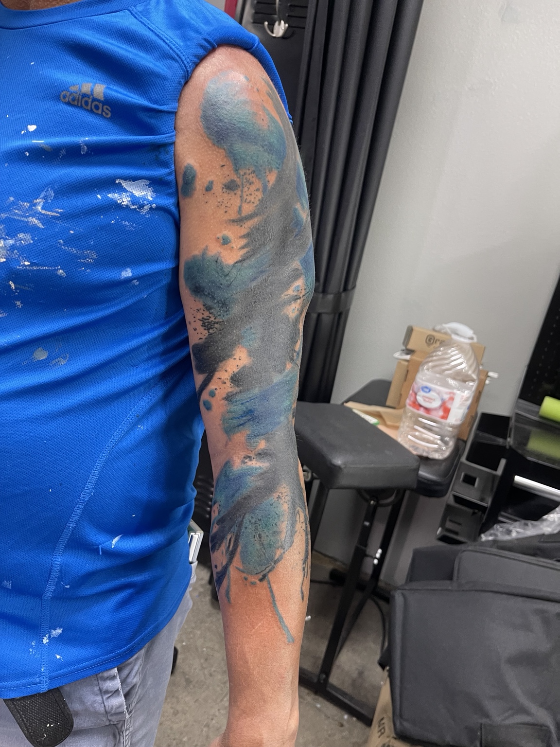 Abstract blackwork arm tattoo alternate view