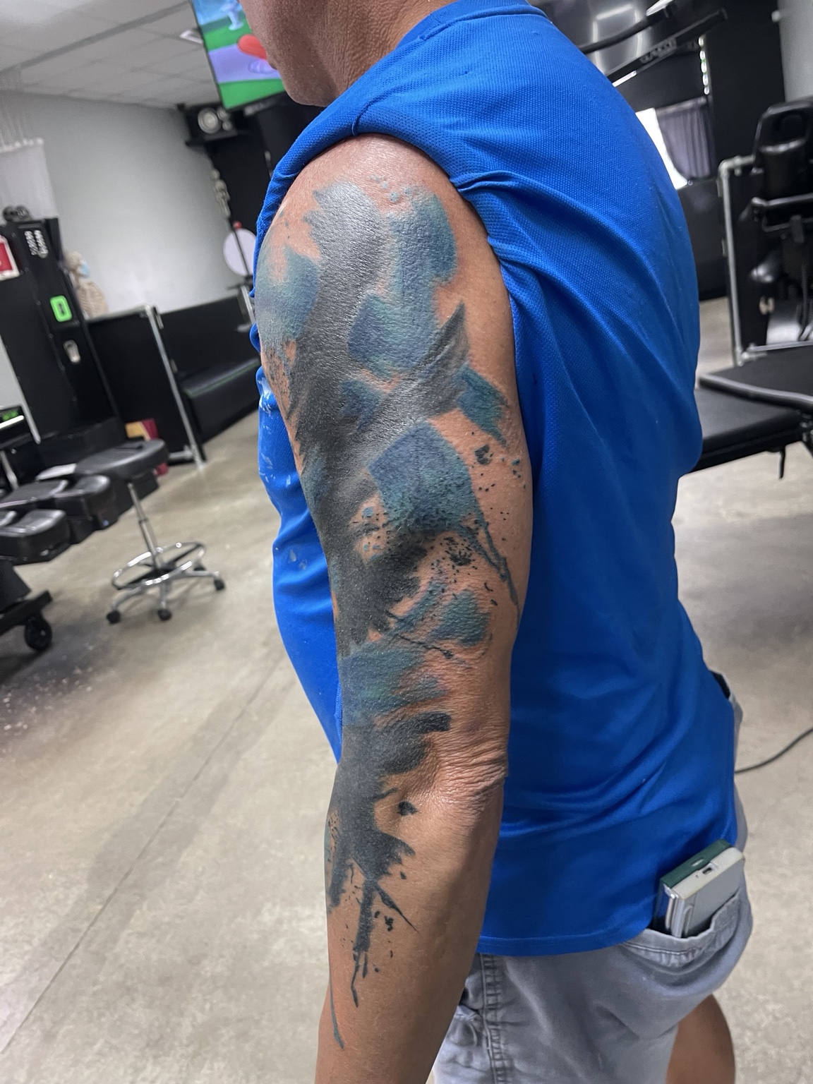 Abstract blackwork arm tattoo alternate view