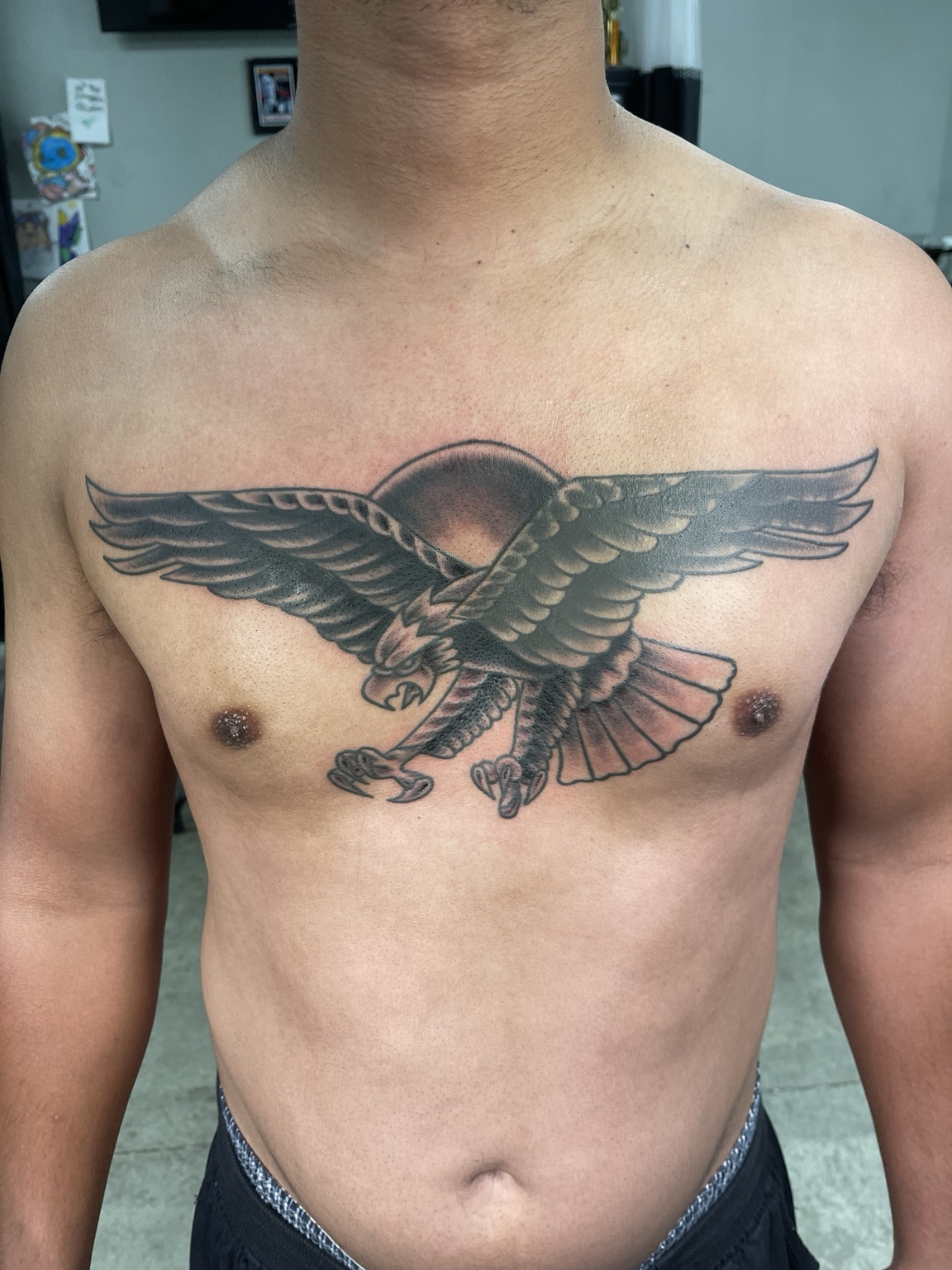 Eagle chest tattoo intermediate stage