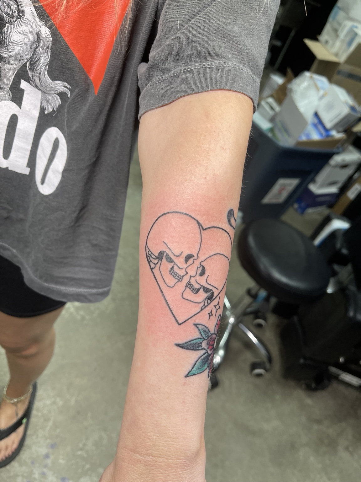 Heart and skull forearm tattoo, view two