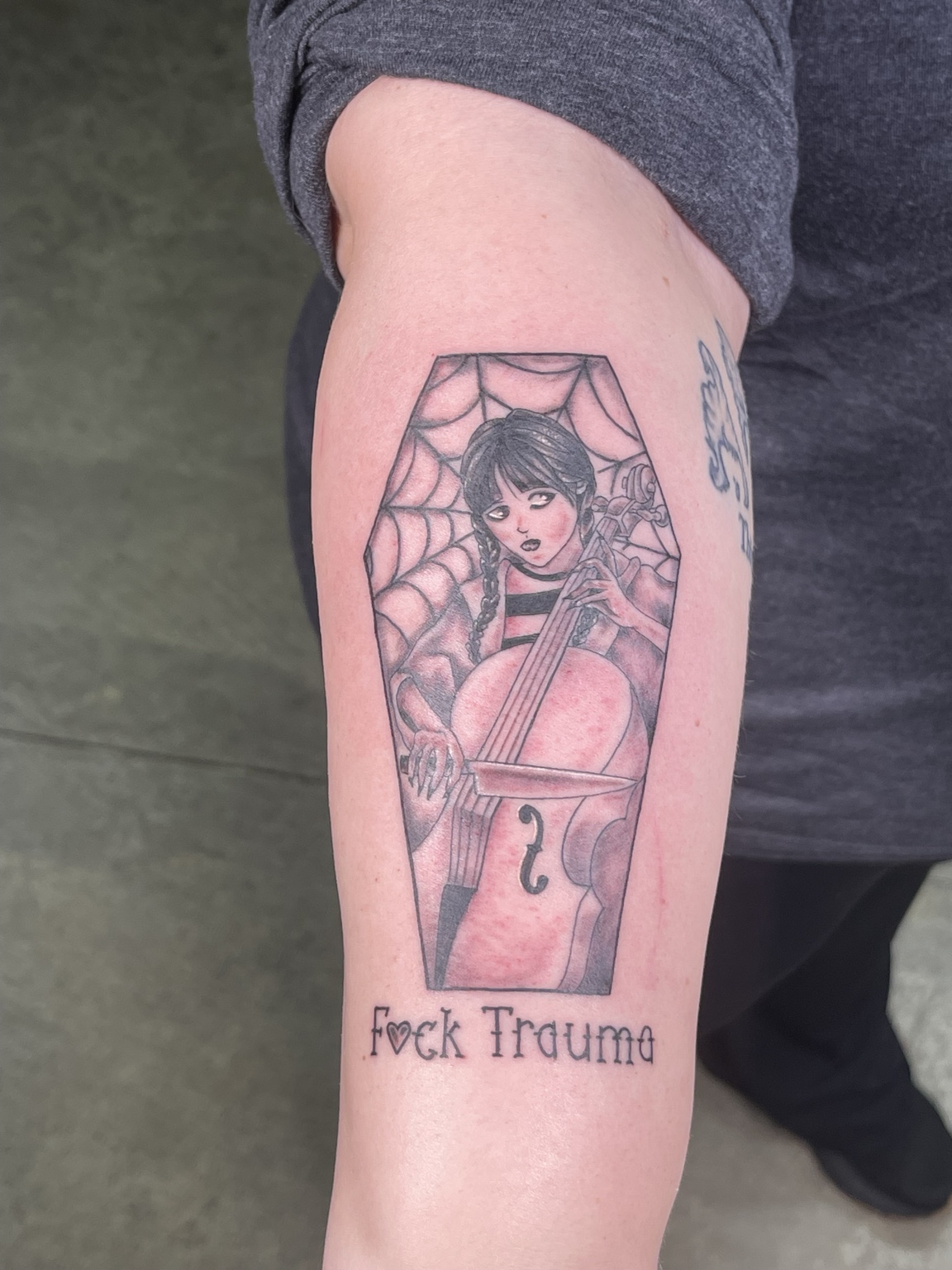Illustrative woman tattoo with spiderweb framing