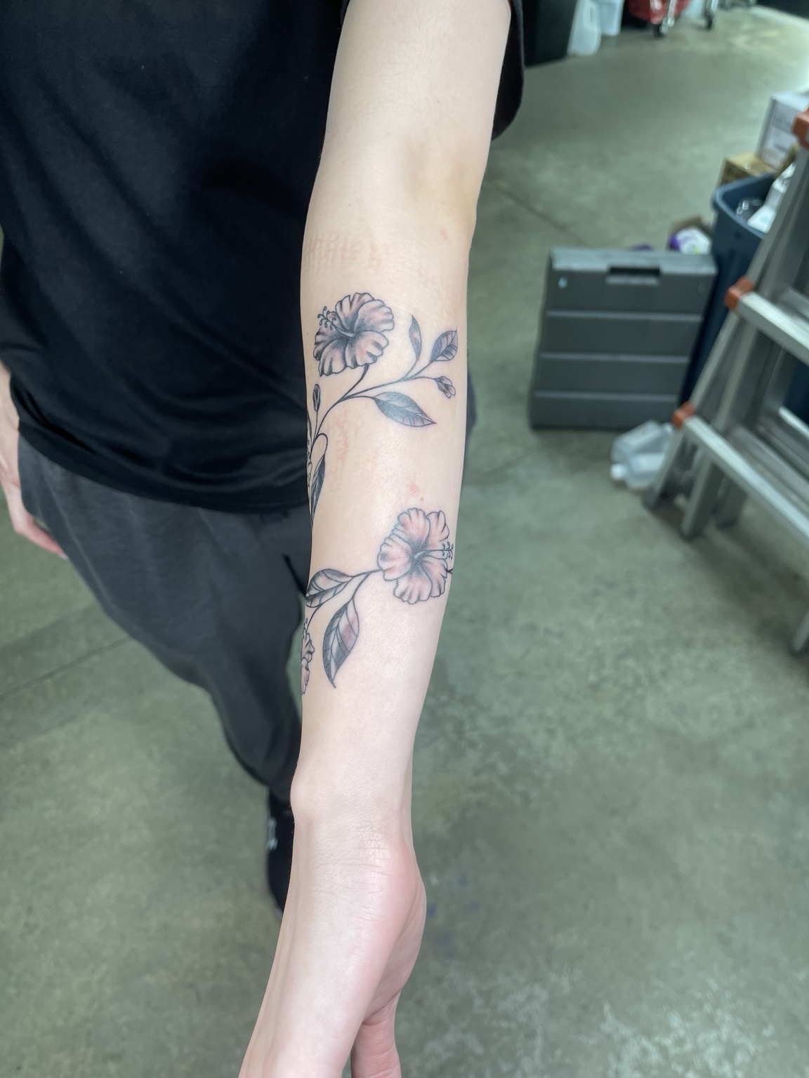Floral forearm tattoo, third view