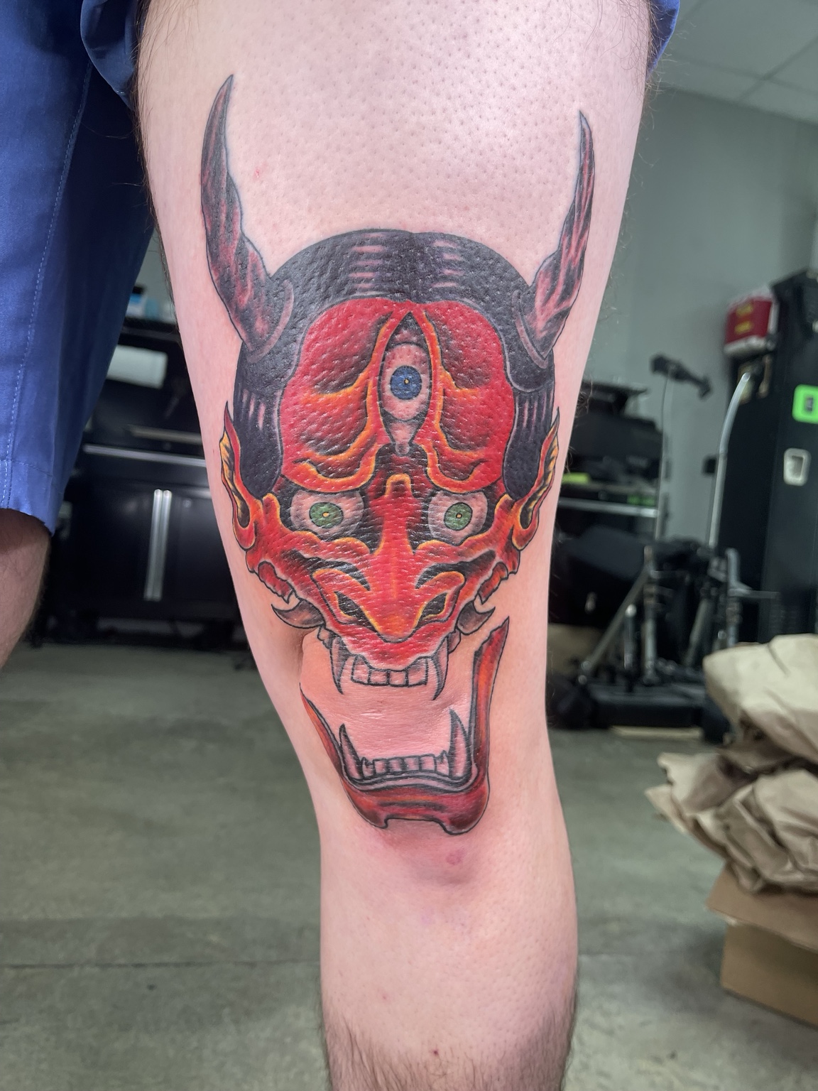 Color oni mask leg tattoo second angle