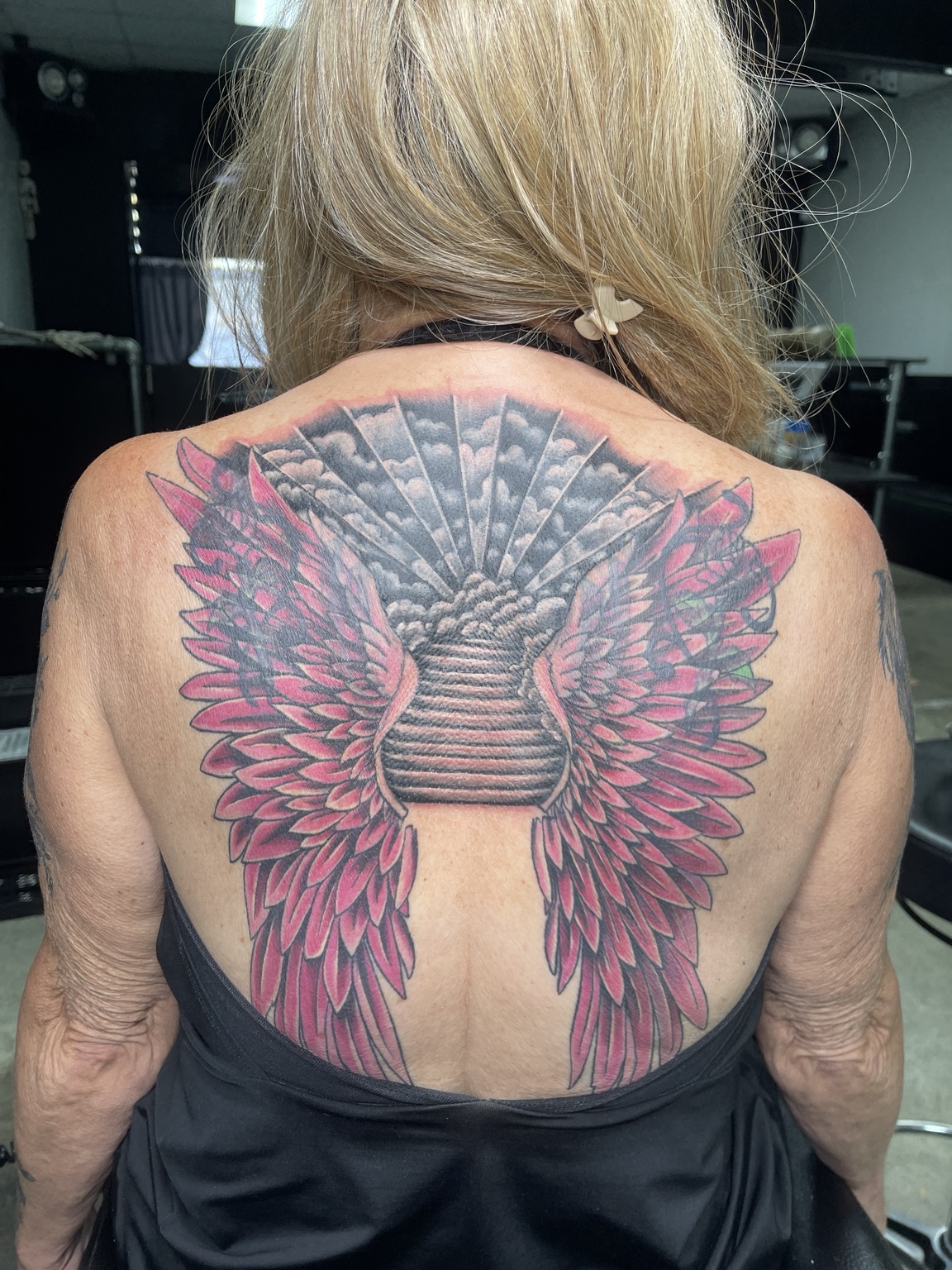 Winged back tattoo additional view