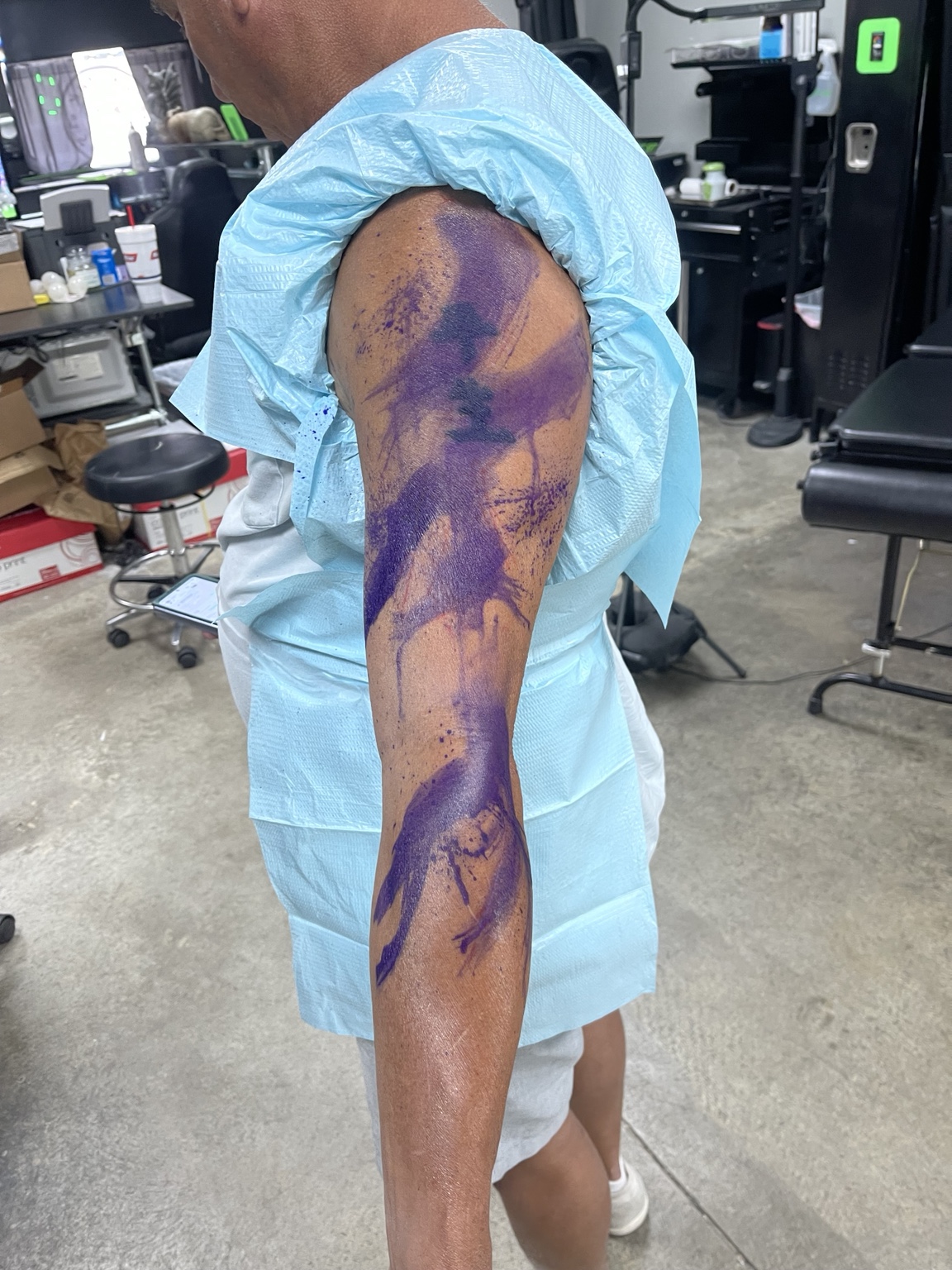 Purple transfer and process stage for abstract arm tattoo