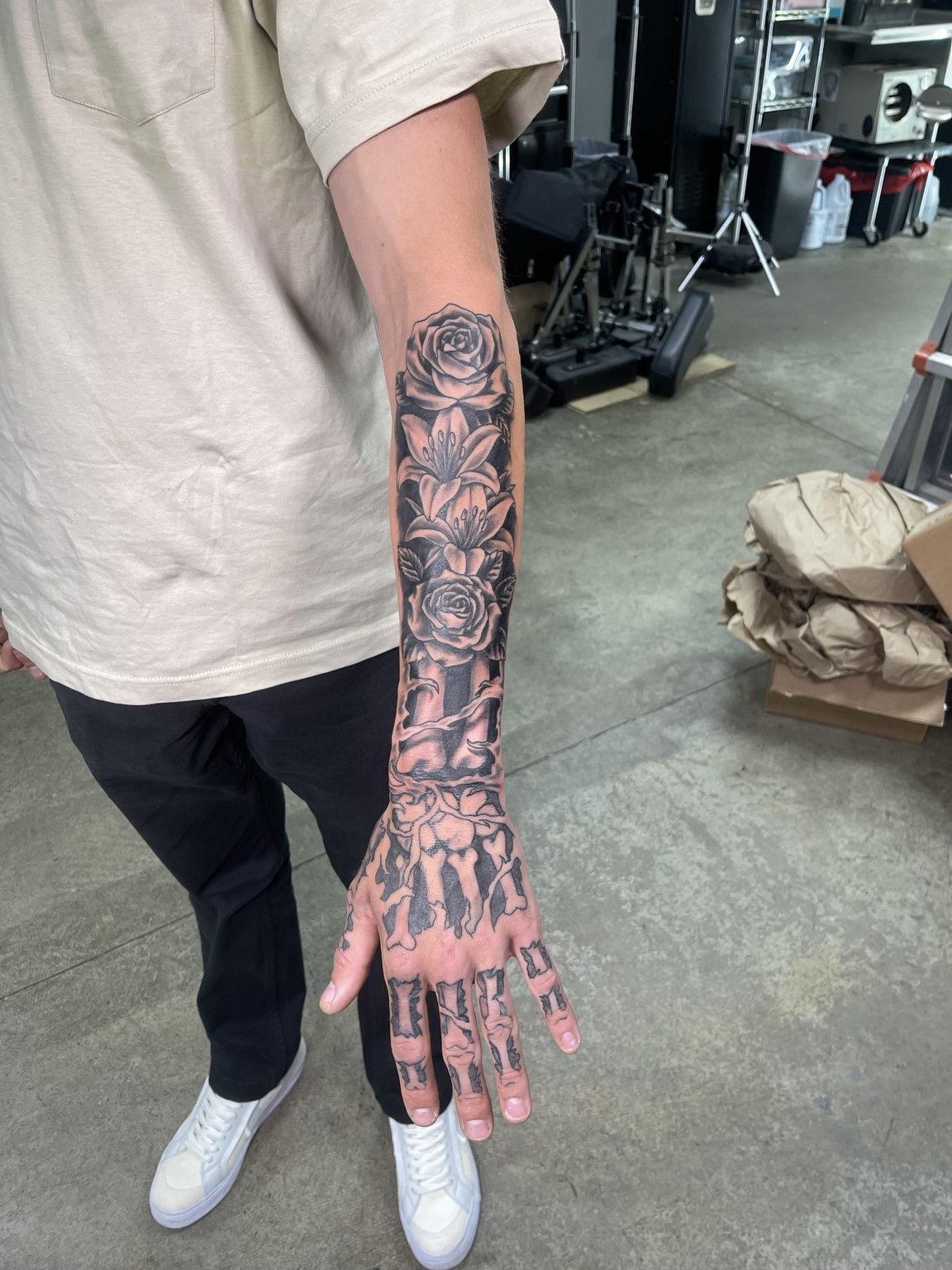 Skeleton hand and forearm tattoo