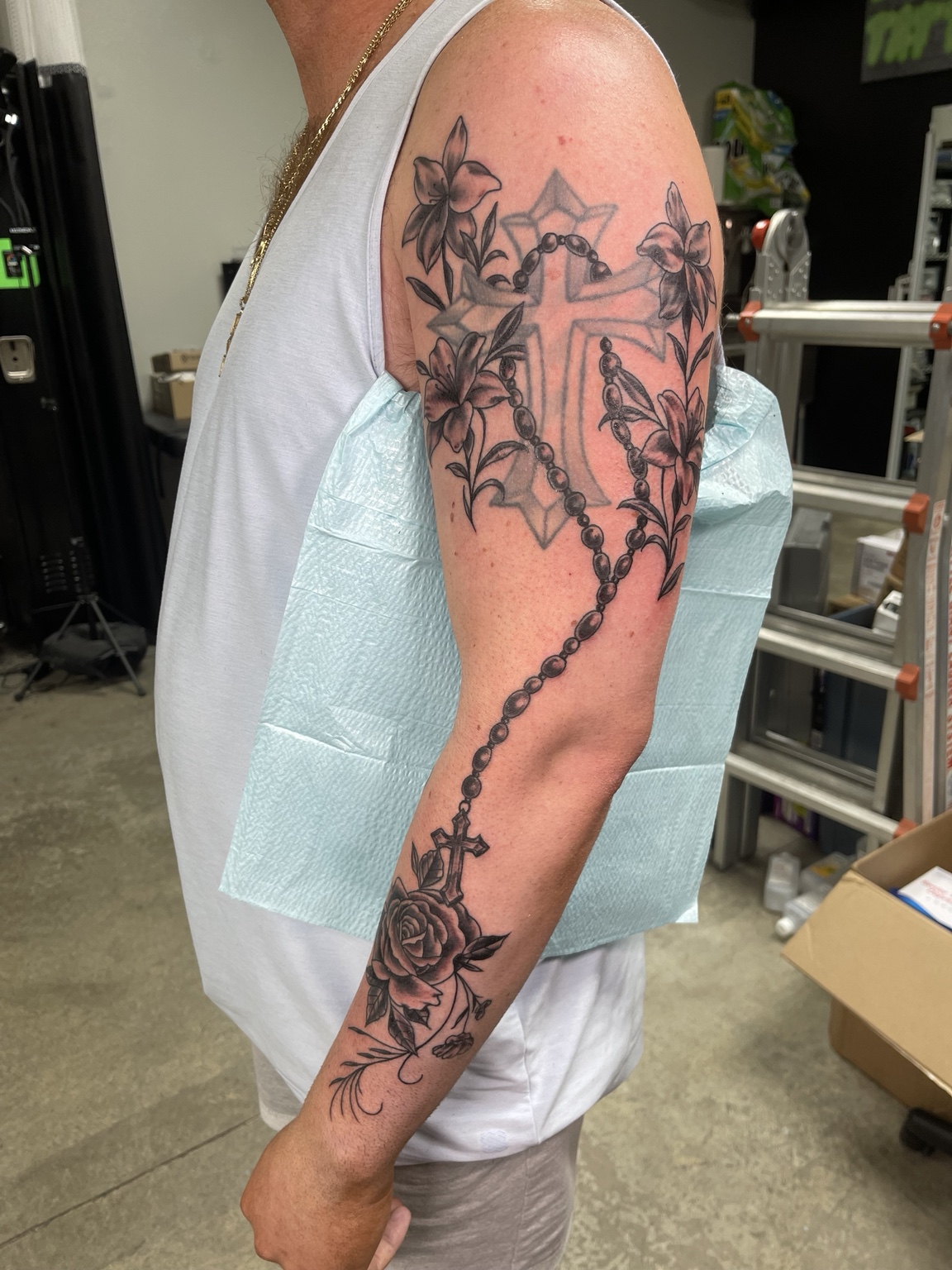 Large black and grey upper arm tattoo alternate view