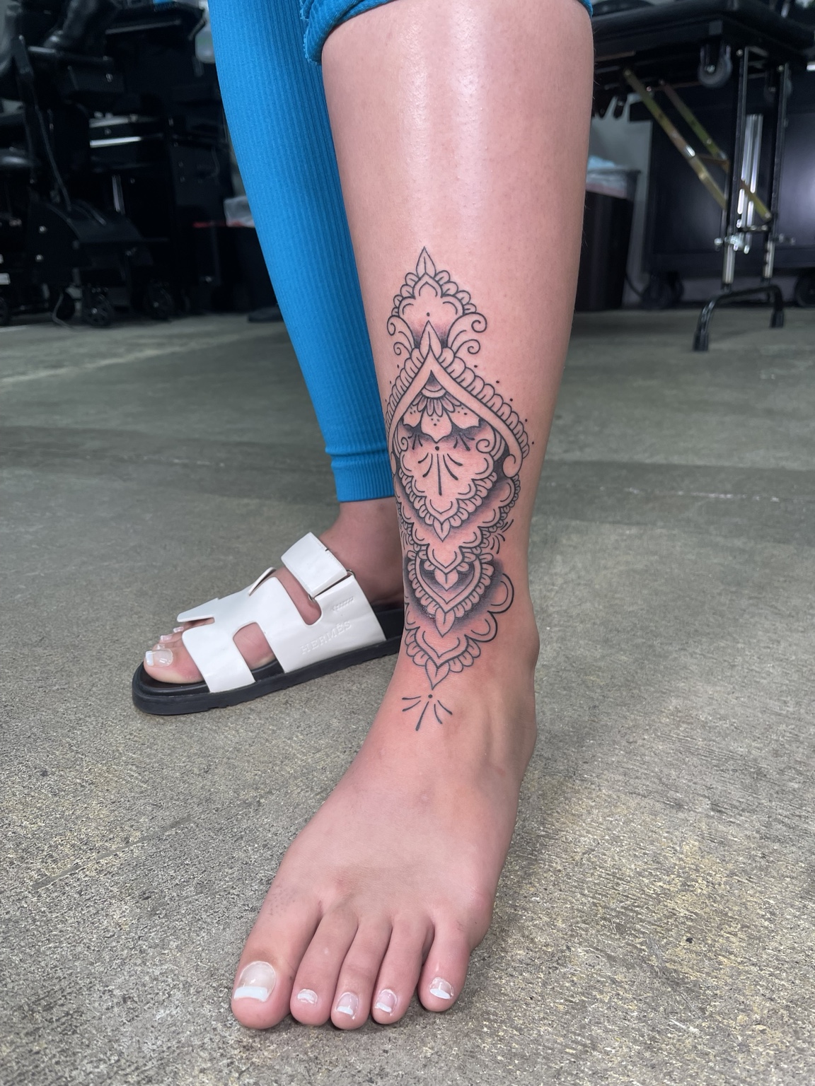 Ornamental foot tattoo third view