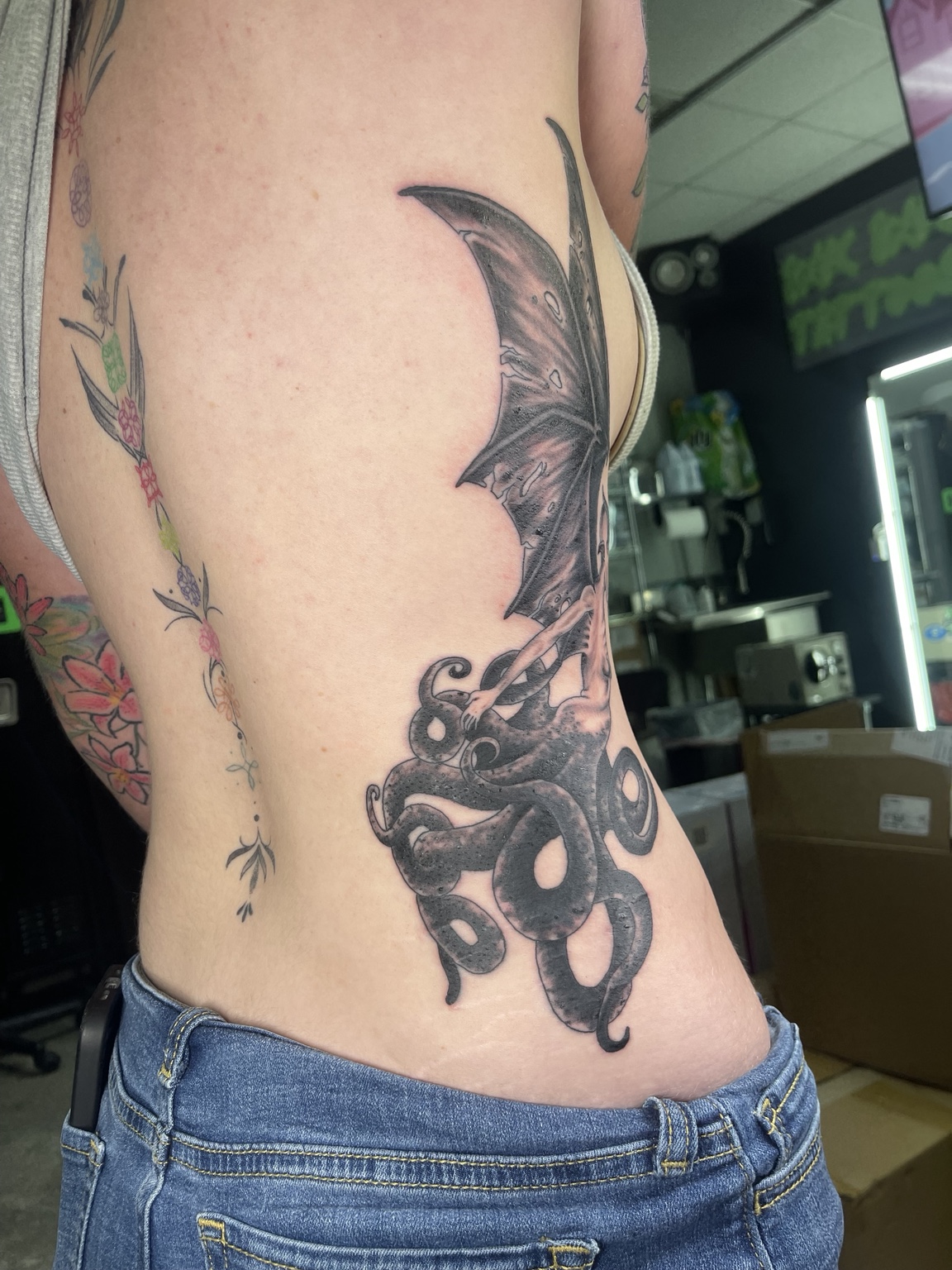 Dragon side tattoo primary view