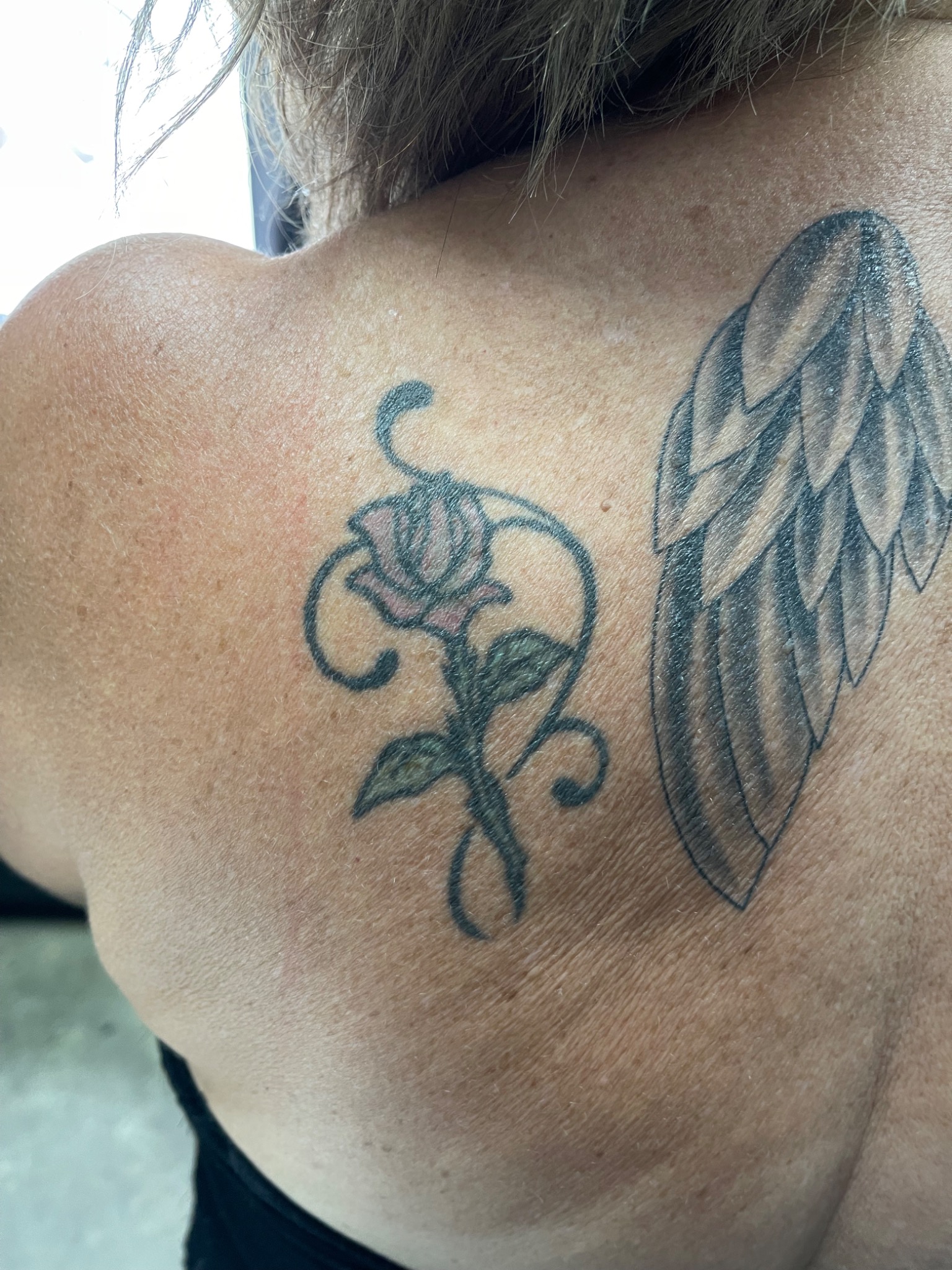 Long script forearm tattoo