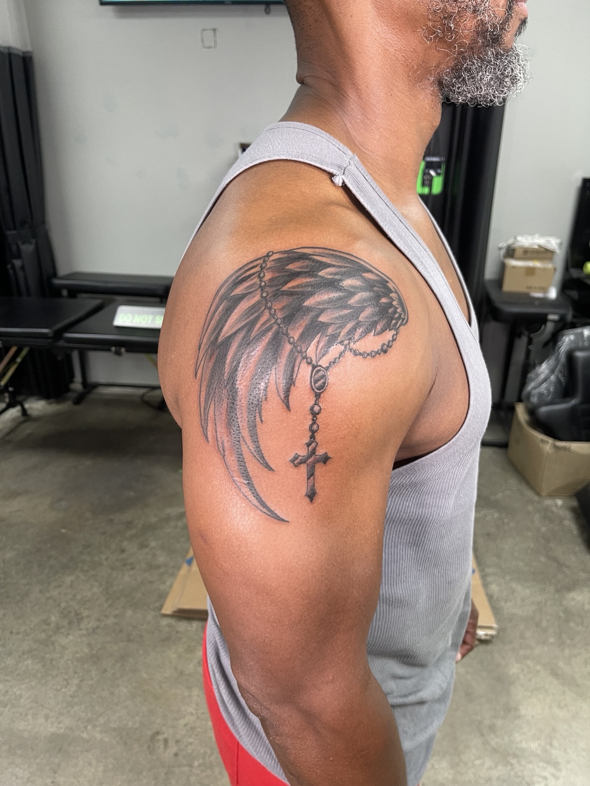 Shaded wing shoulder tattoo