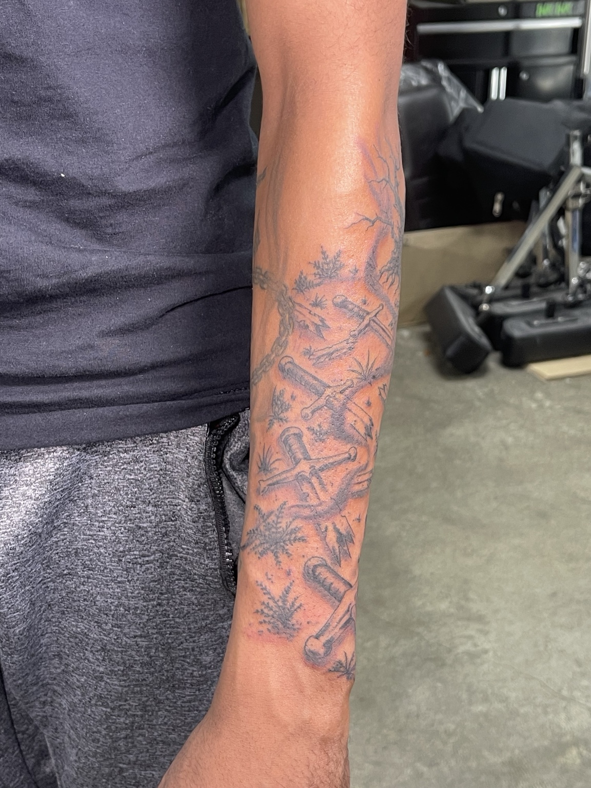 Completed color forearm and arm tattoo project