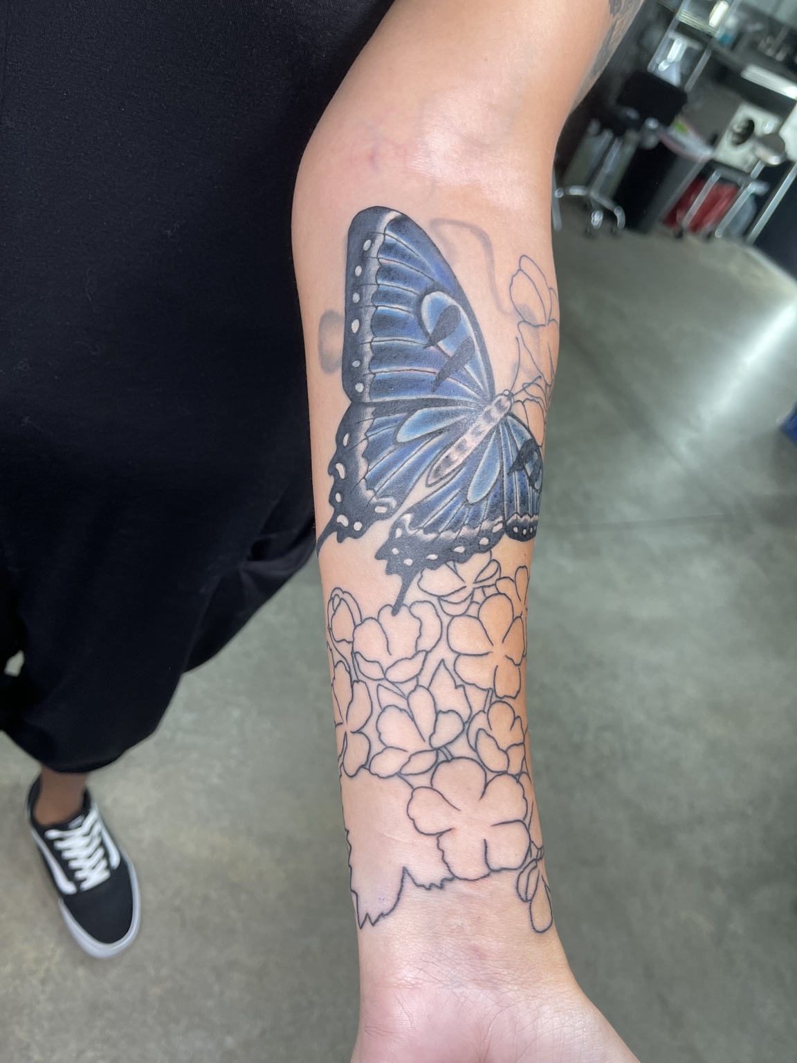 Butterfly and honeycomb forearm tattoo first view