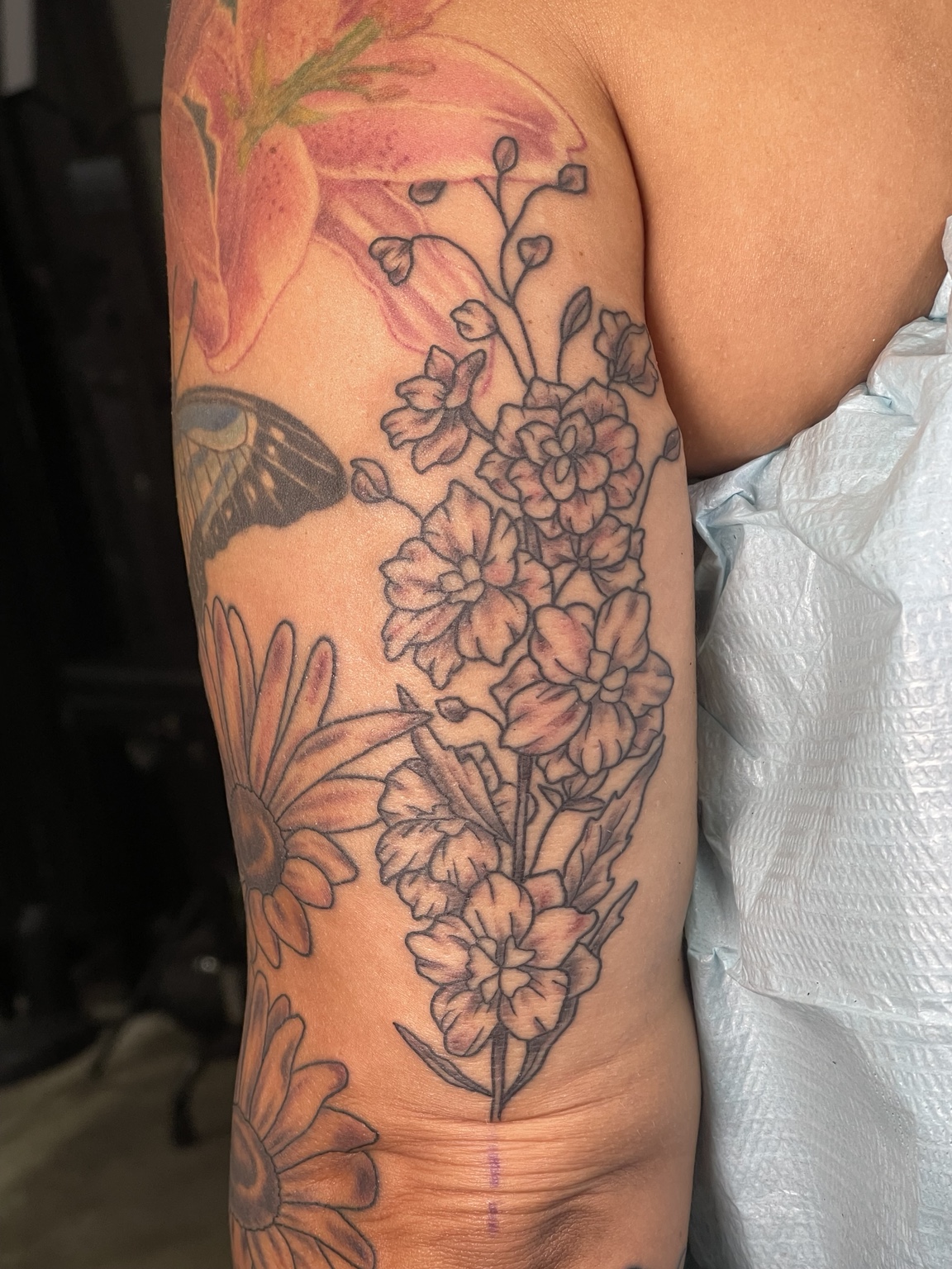 Floral arm tattoo alternate view