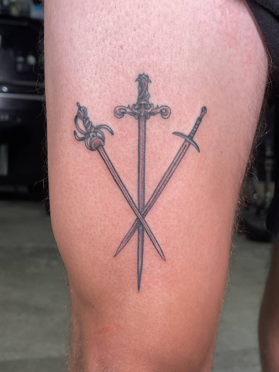 Three swords tattoo