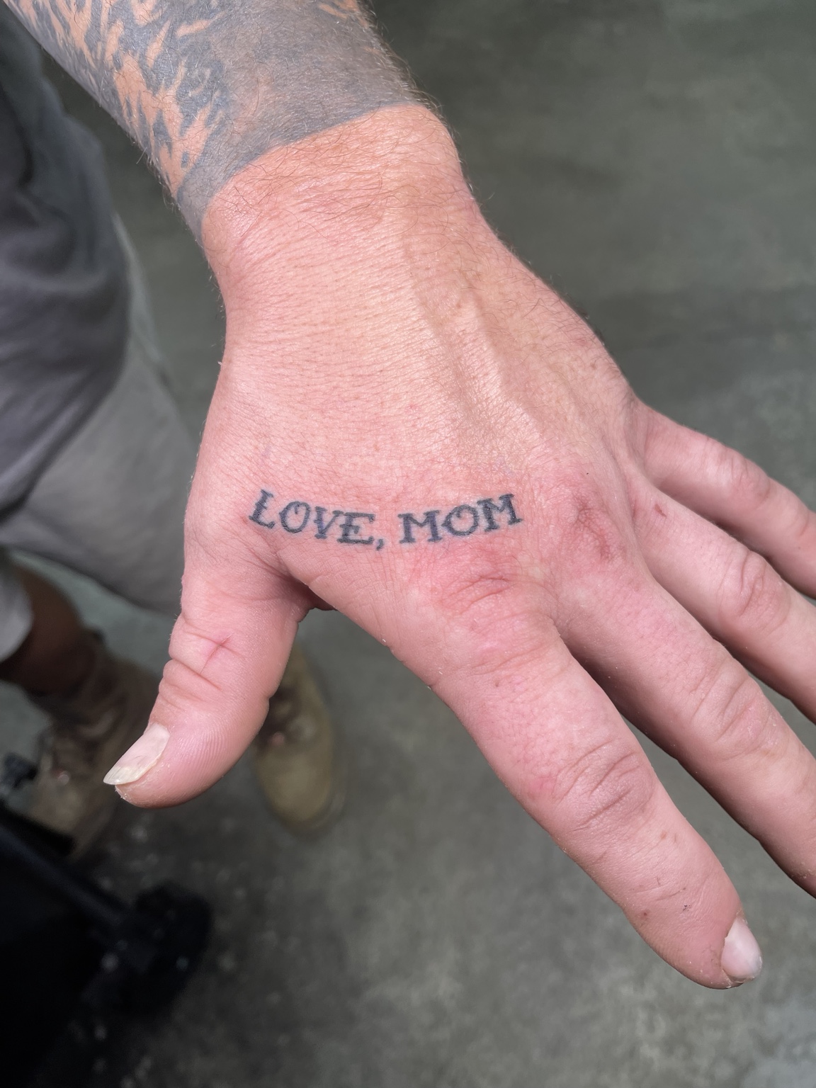 LOVE MOM hand tattoo