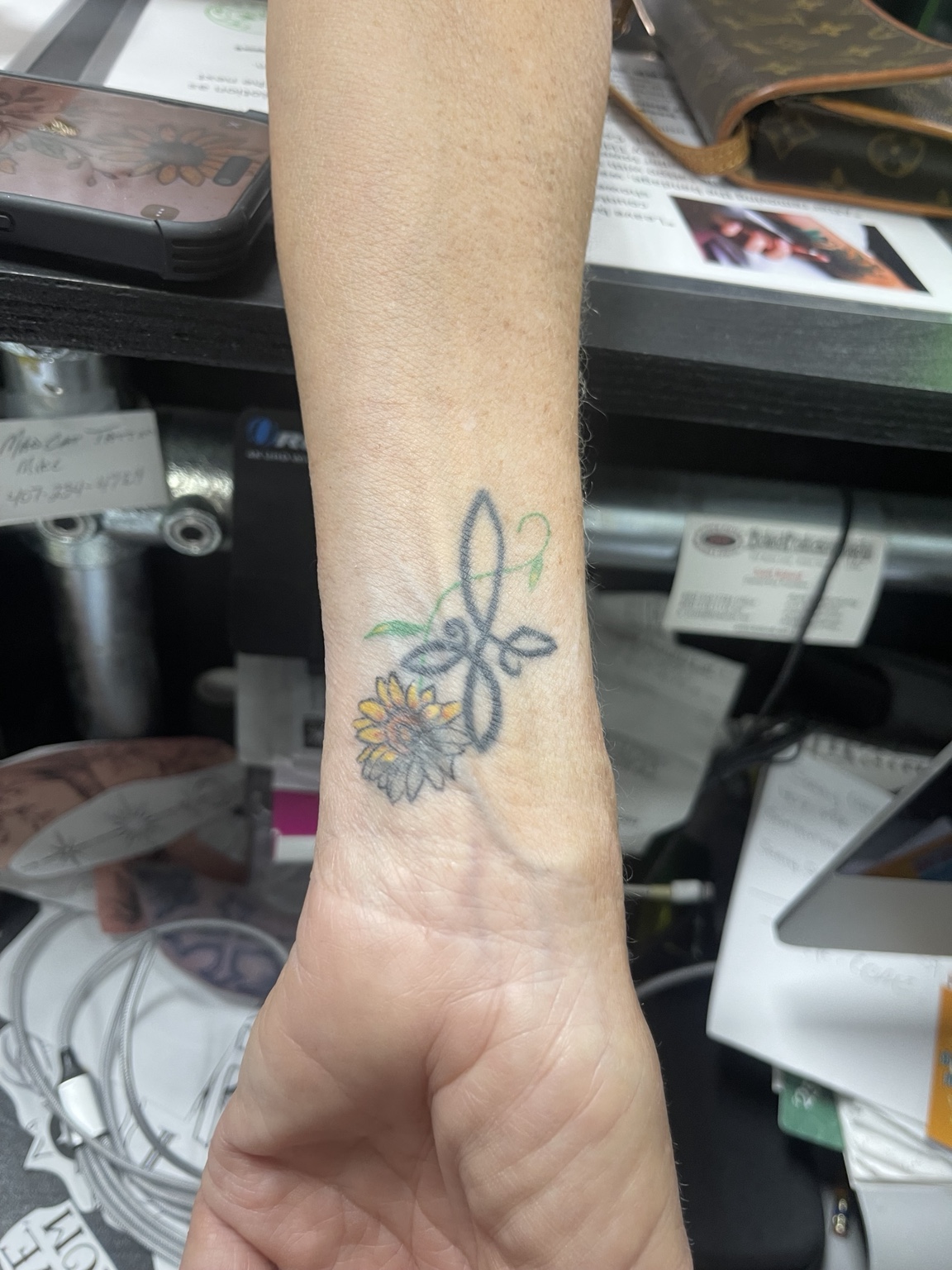 Small wrist tattoo first view