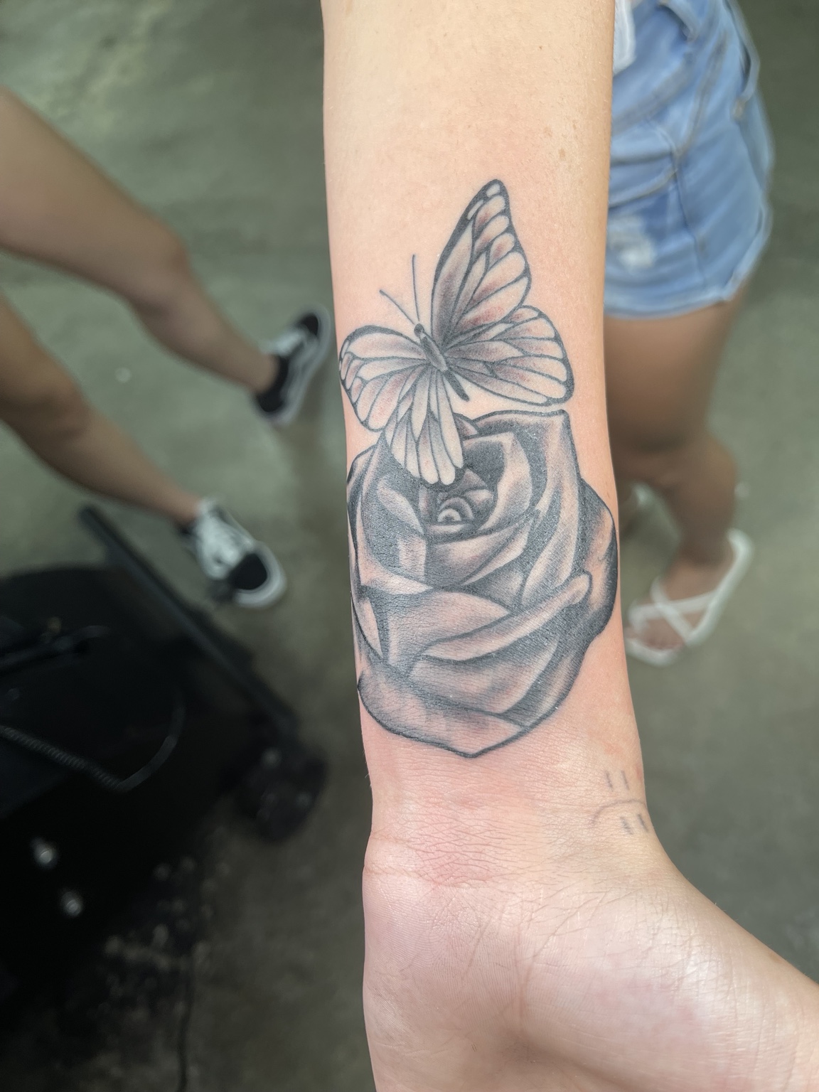 Rose hand tattoo first view