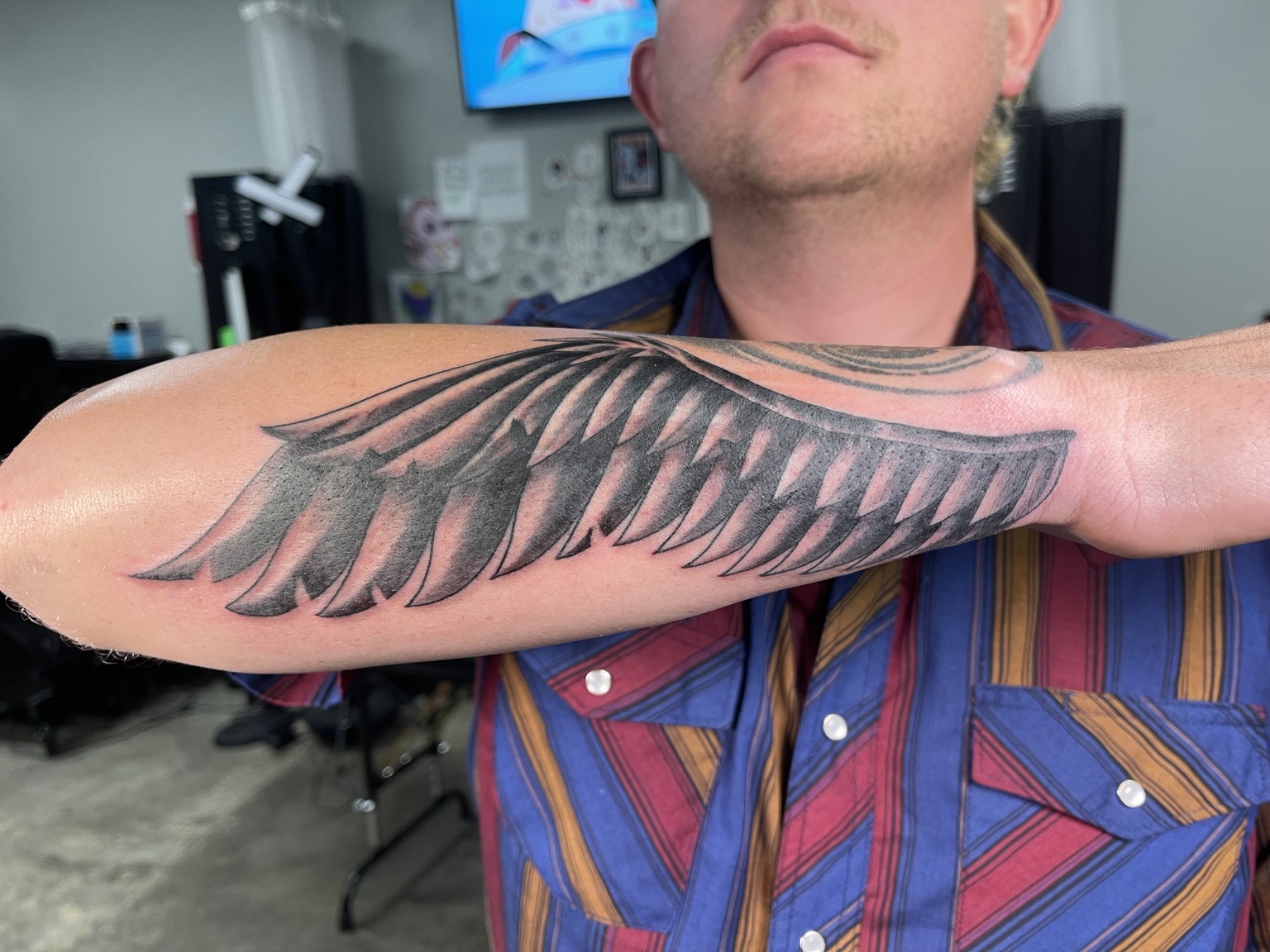 Wing forearm tattoo second view