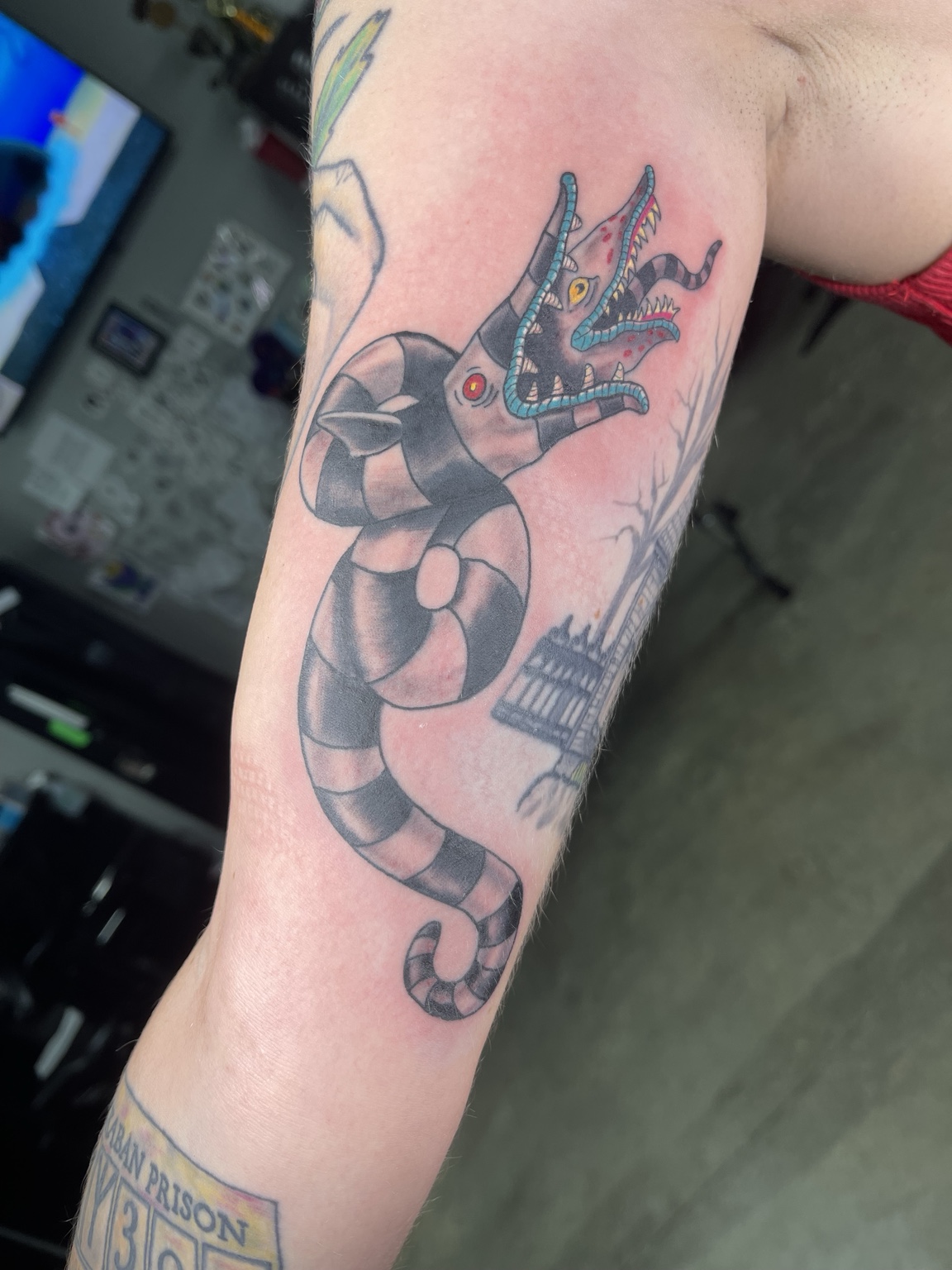 Color character forearm tattoo