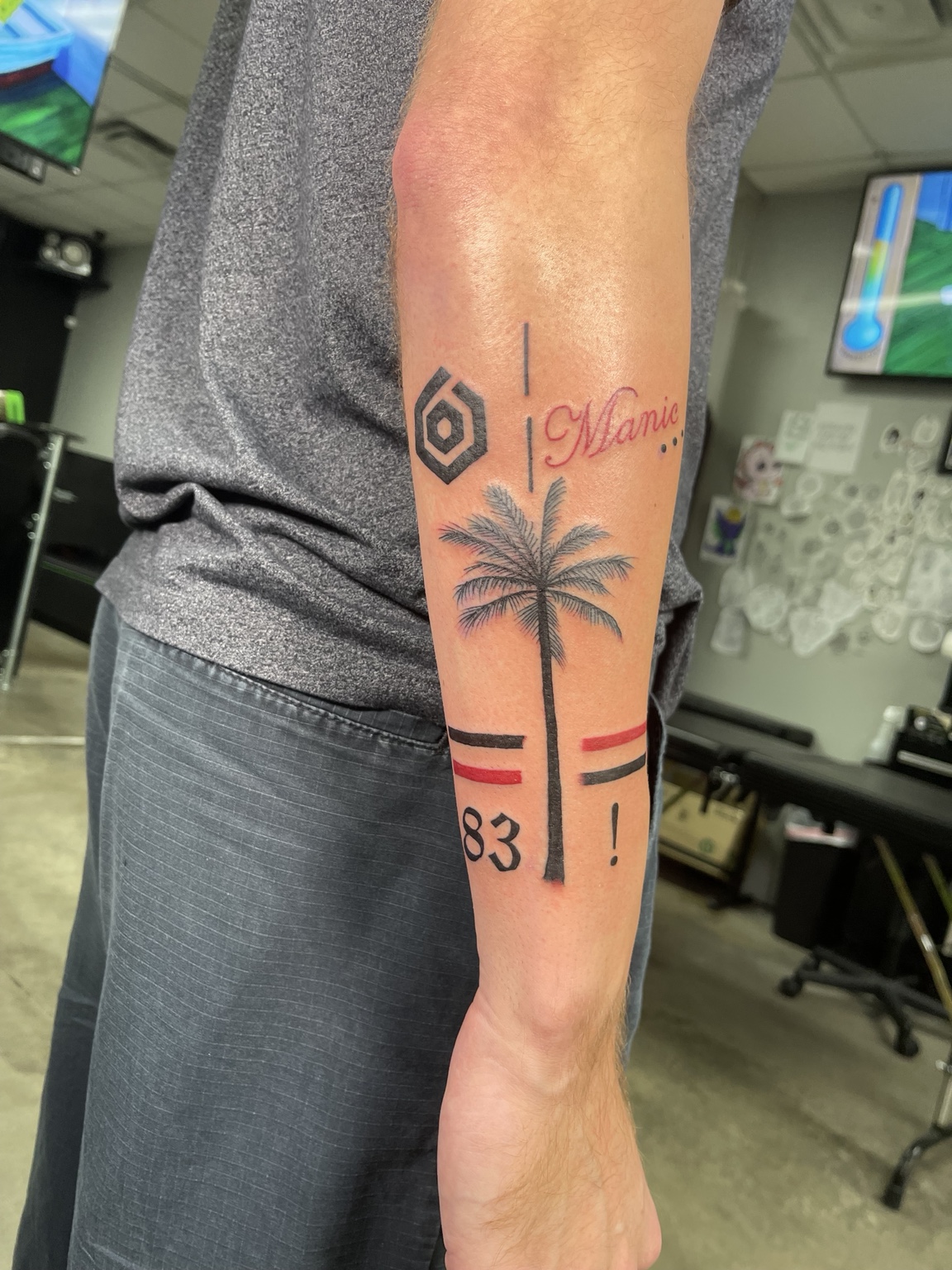 Palm tree arm tattoo third view