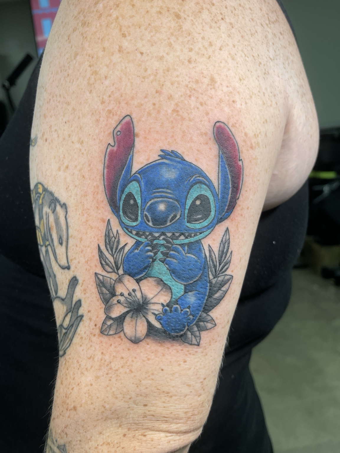Stitch floral tattoo