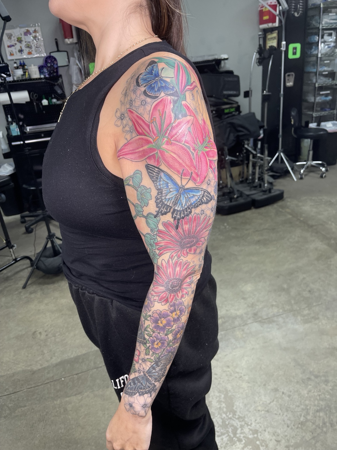 Color floral arm tattoo