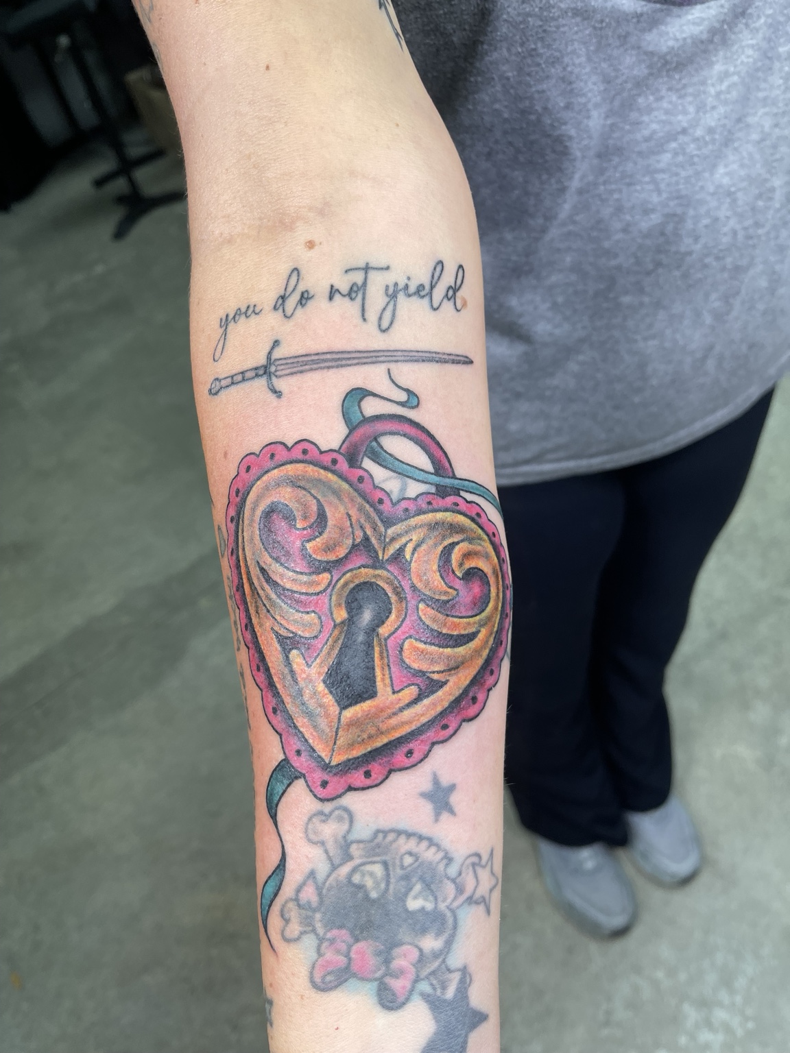Heart forearm tattoo alternate view