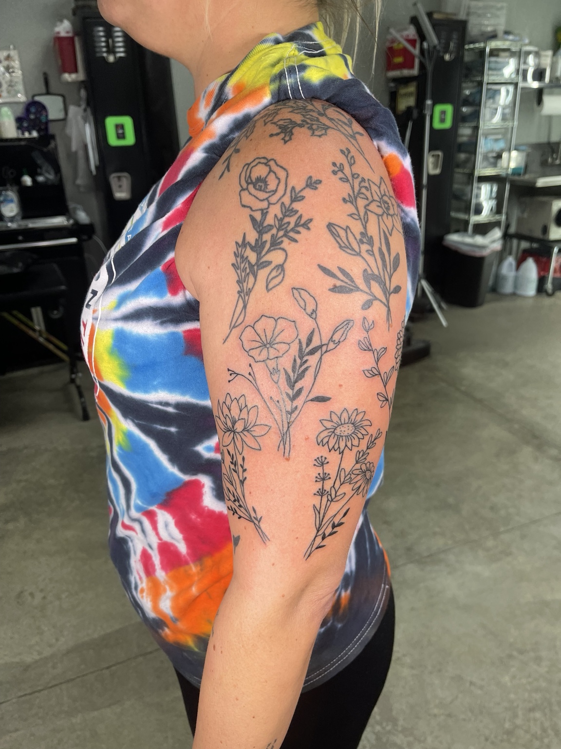 Floral upper arm tattoo alternate view
