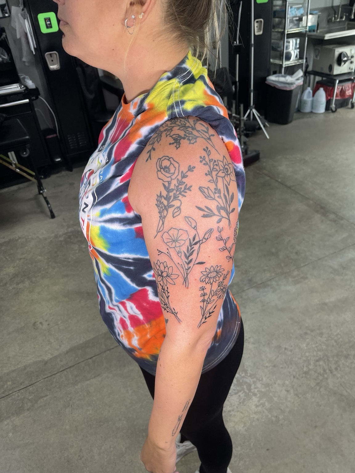 Floral upper arm tattoo alternate view