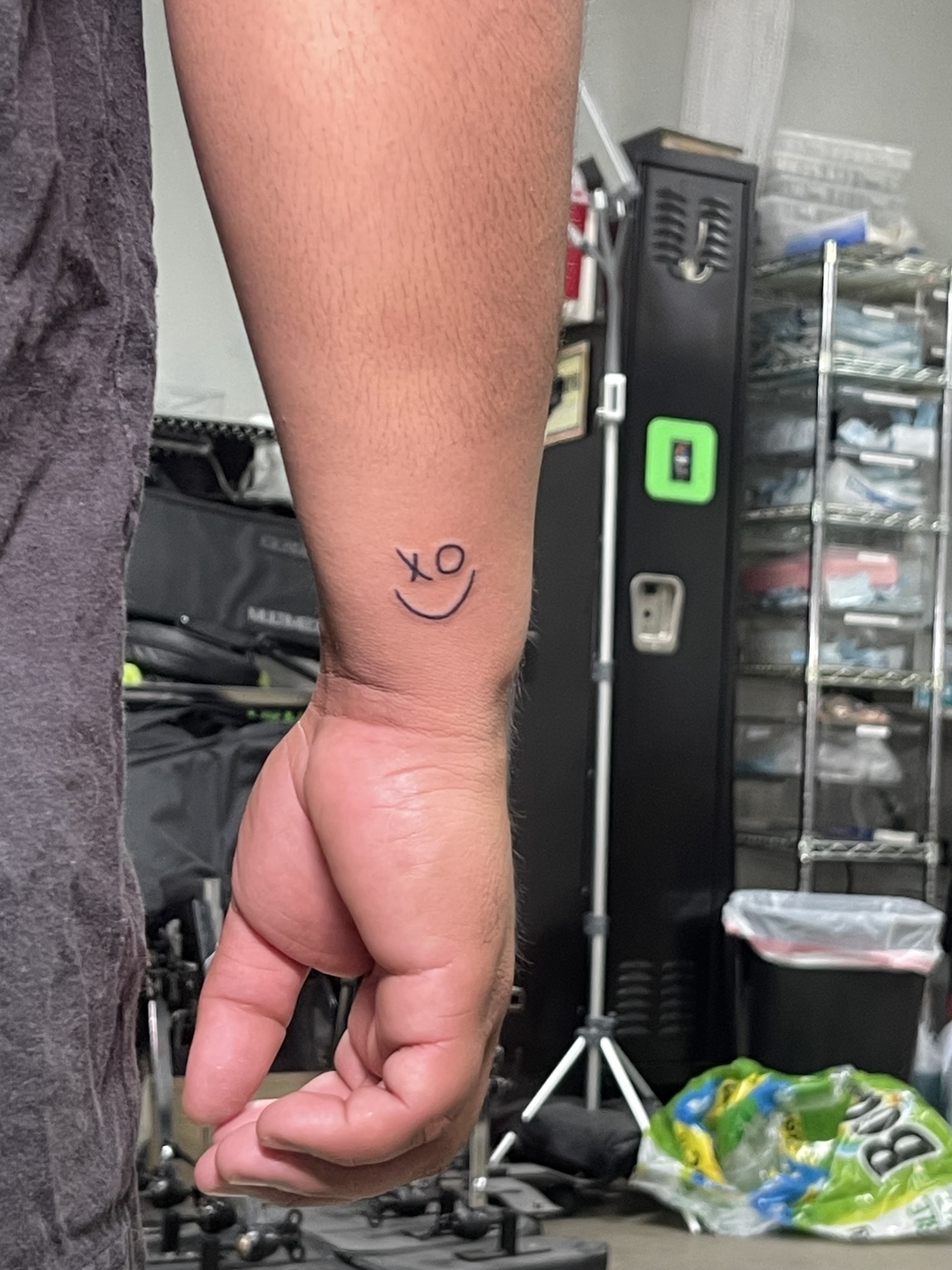Small wrist symbol tattoo second view