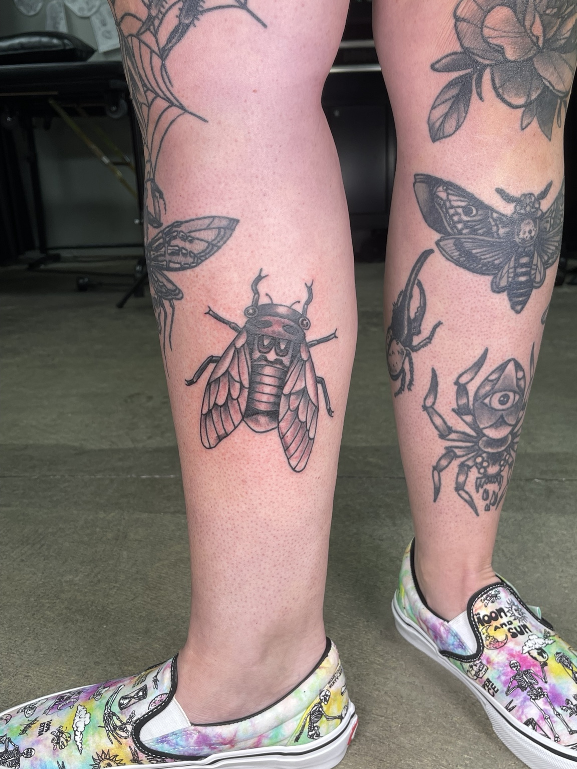 Multiple leg tattoos shown together