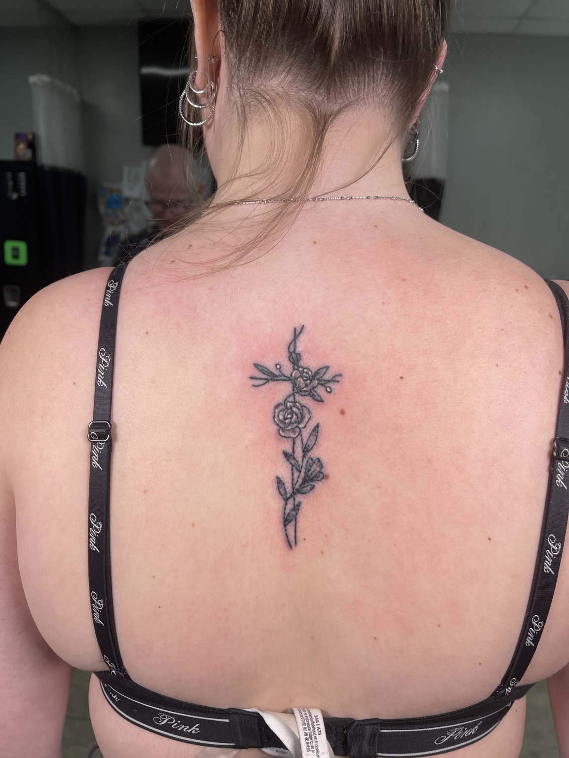 Botanical back tattoo close view