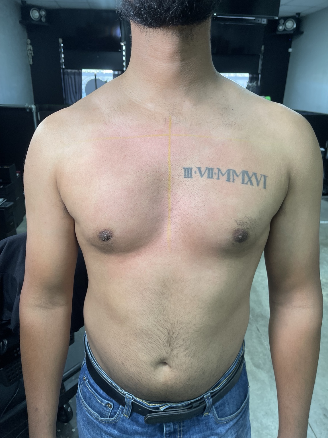 Small chest lettering tattoo