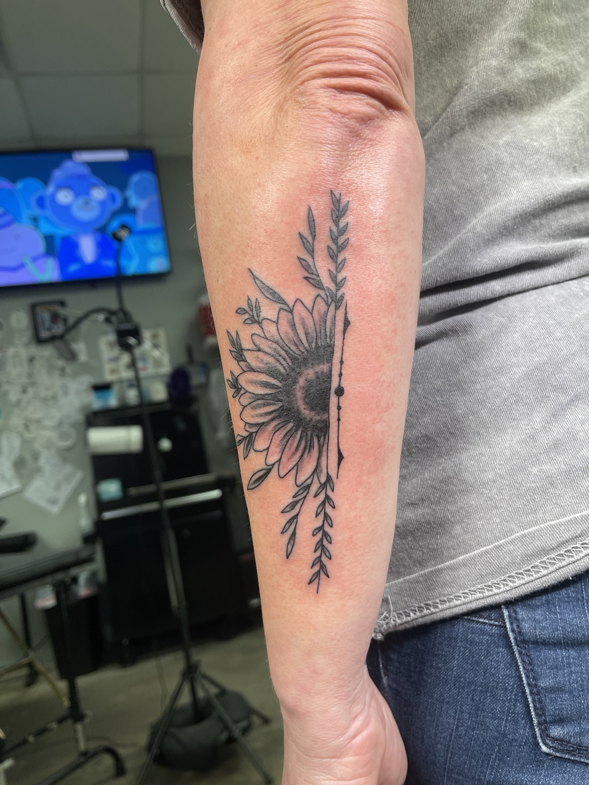 Sun upper arm tattoo first view