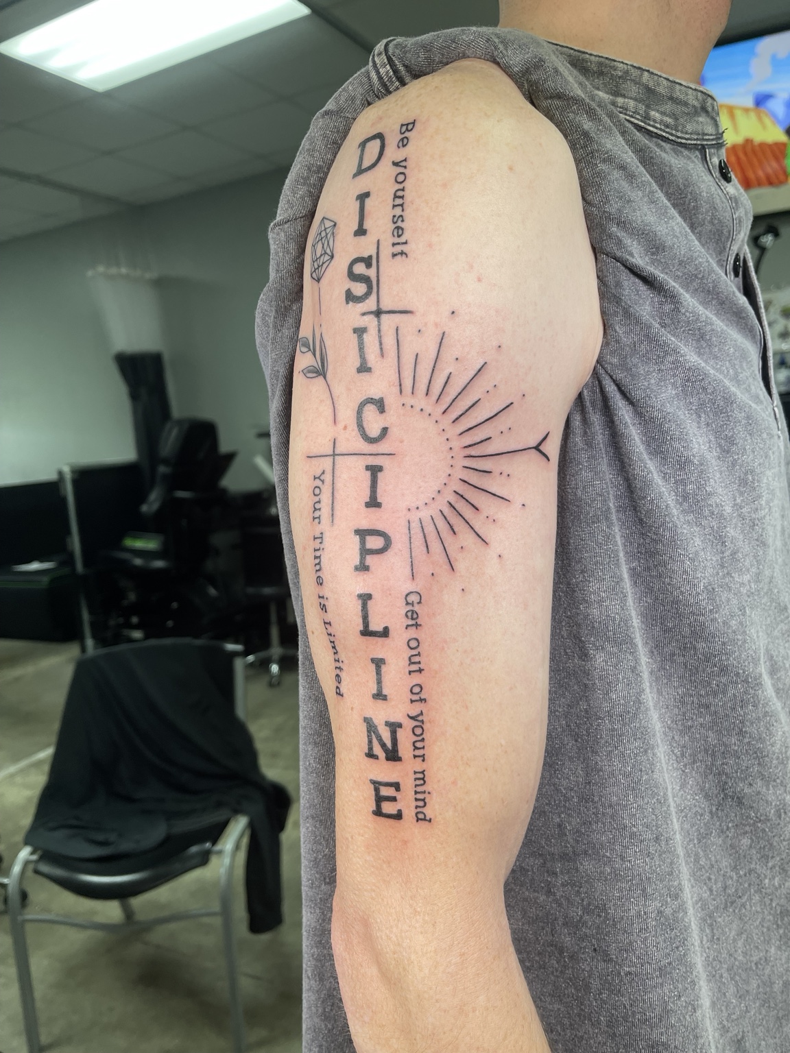Vertical discipline lettering tattoo primary view