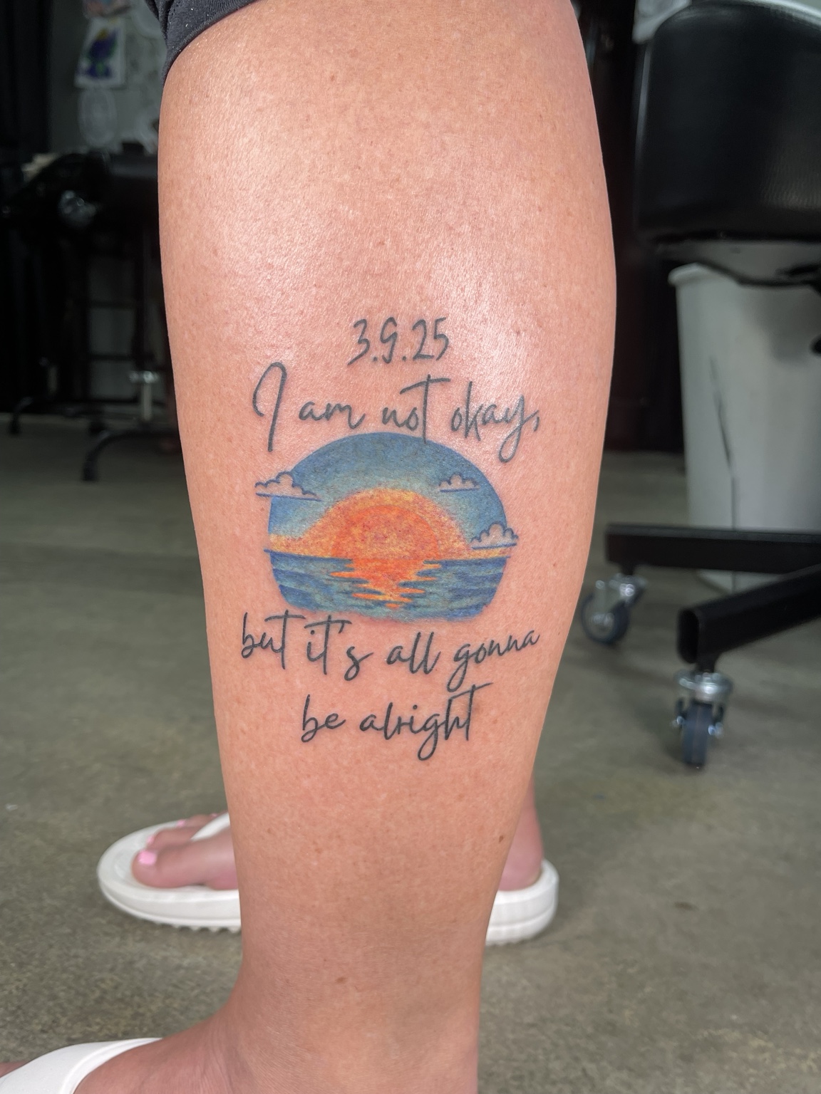 Color landscape forearm tattoo