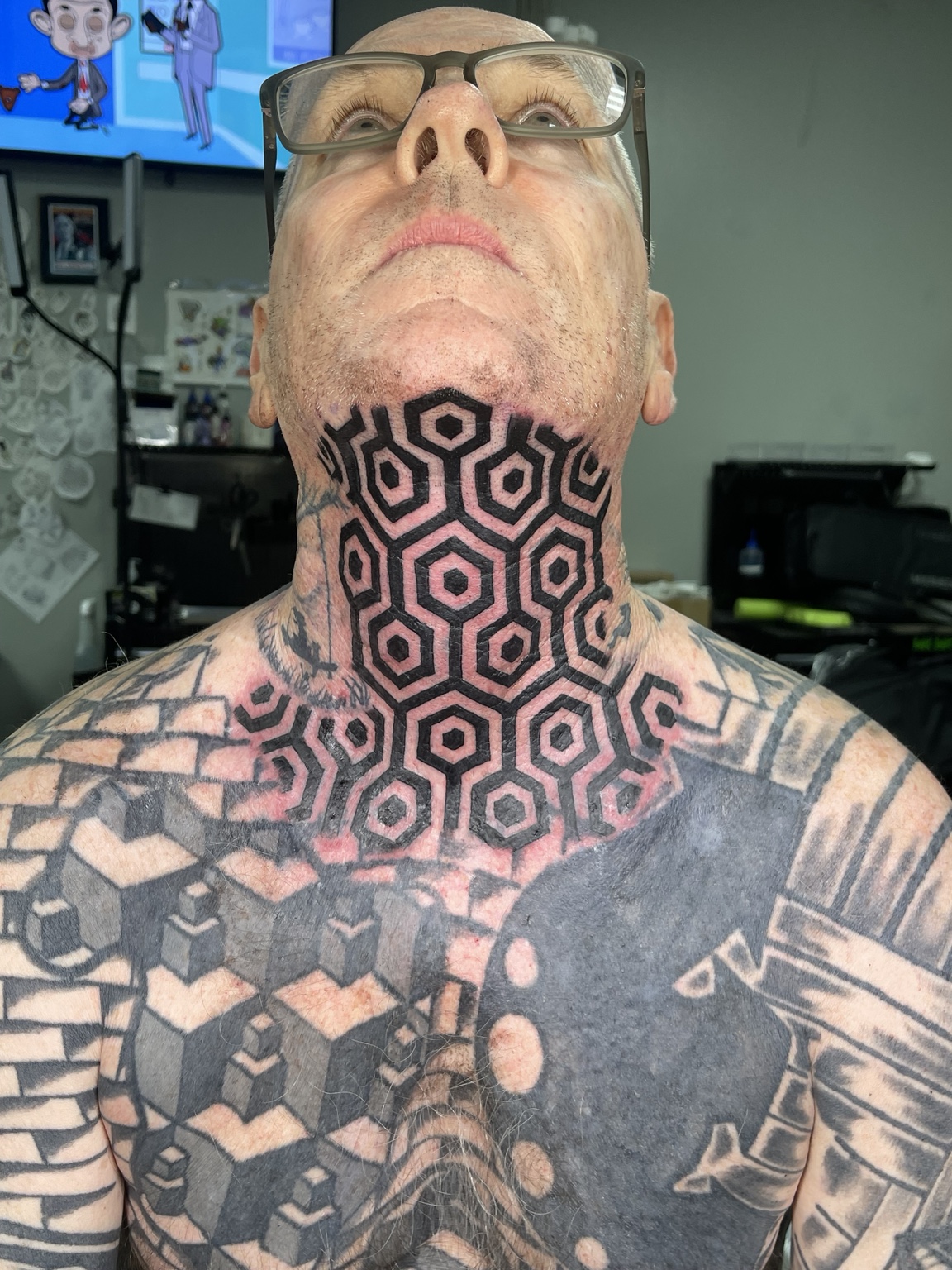 Geometric neck tattoo front view