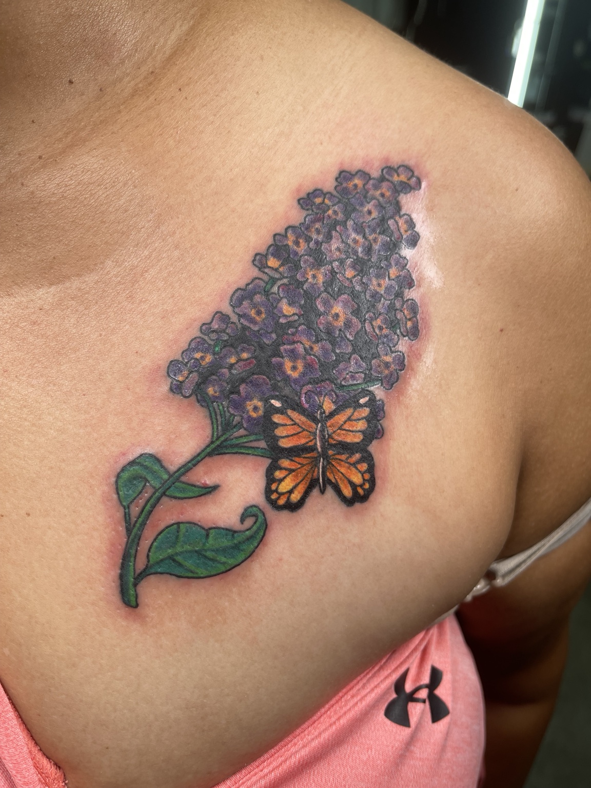 Purple transfer process stage for floral forearm tattoo