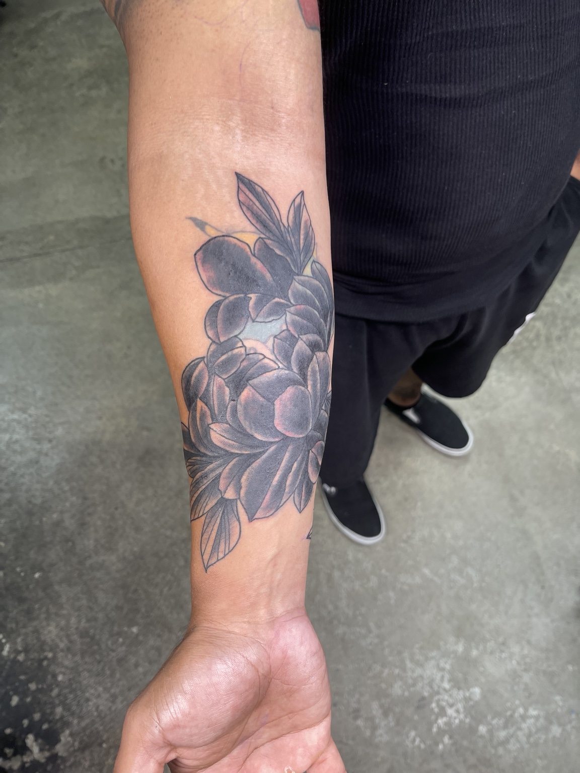 Developed floral forearm tattoo alternate view
