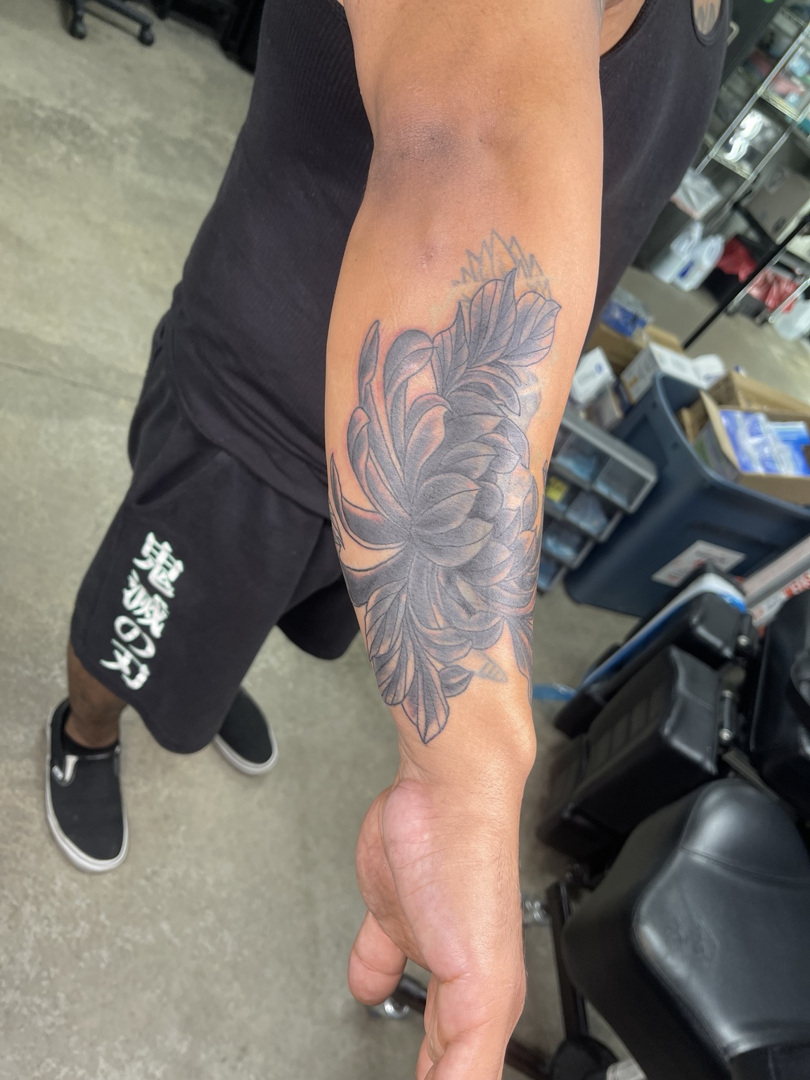 Floral forearm tattoo alternate view