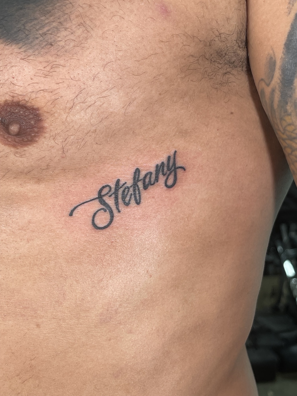 Small script tattoo