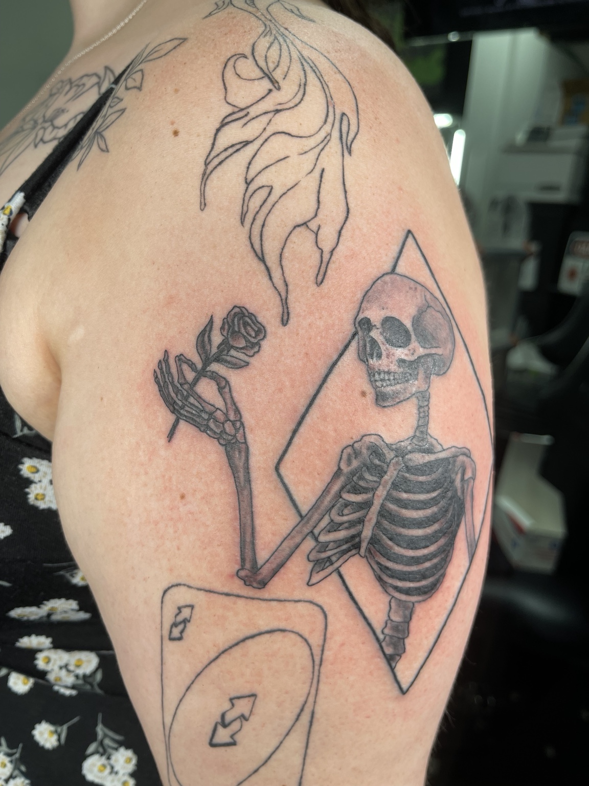Skeleton upper arm tattoo alternate view