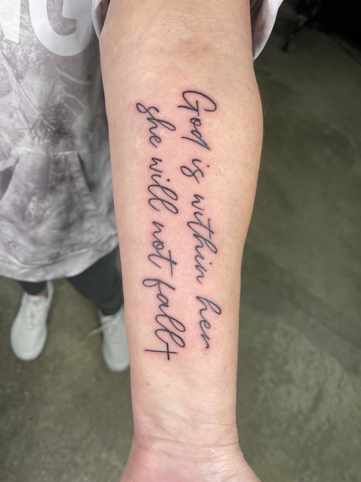 Script forearm tattoo