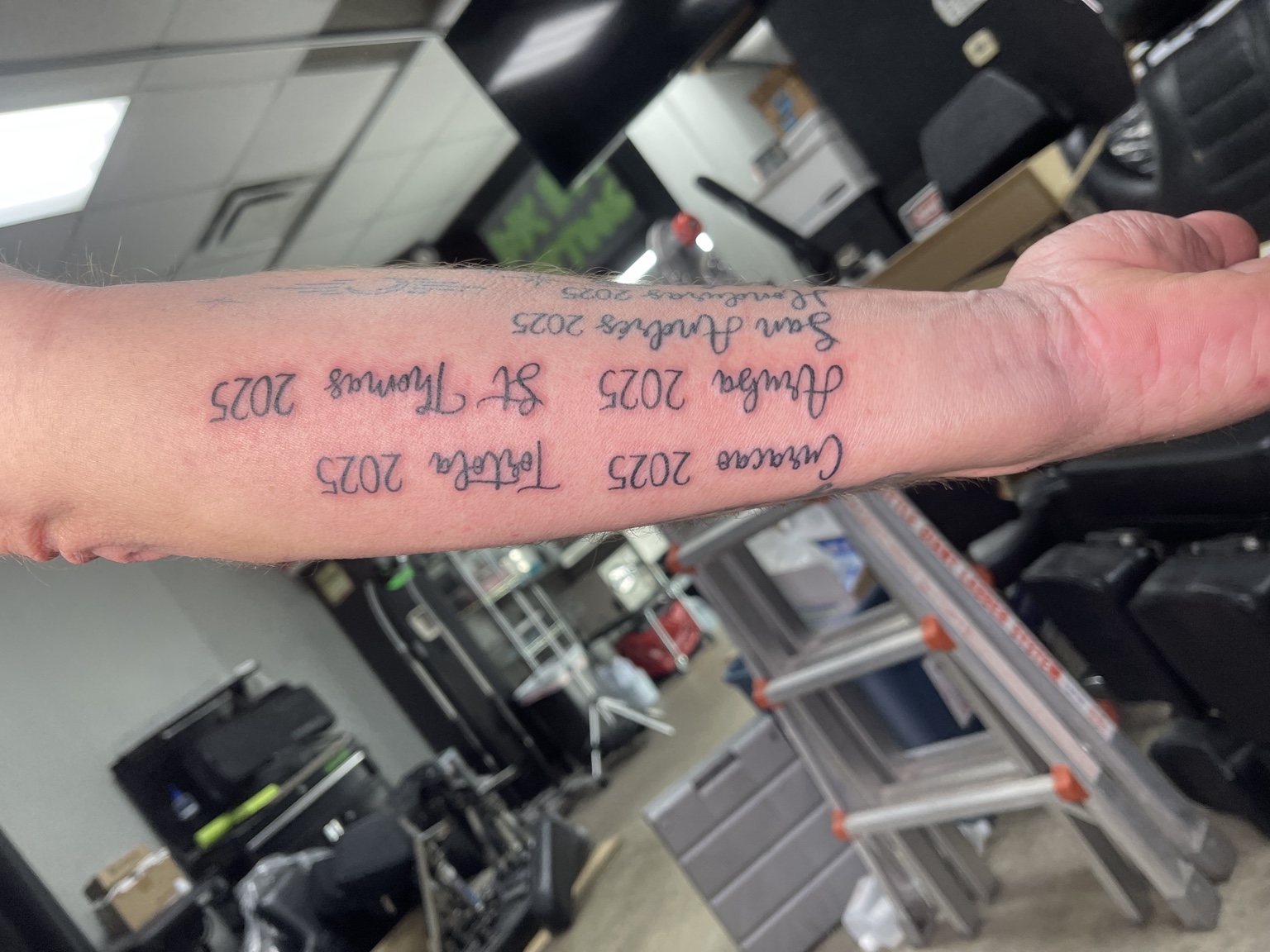 Script forearm tattoo