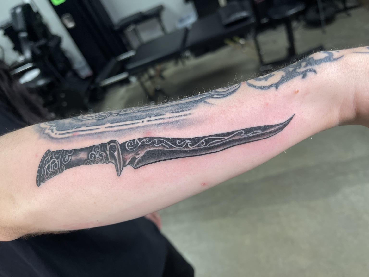 Sword forearm tattoo