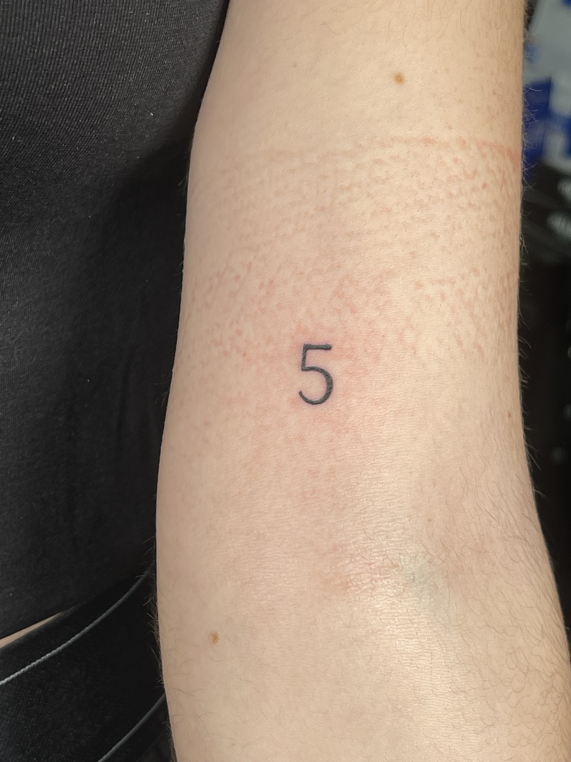 Small matching number five tattoo